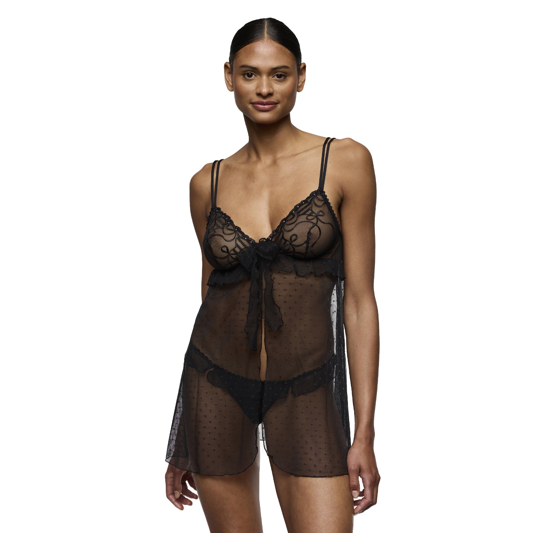 Front view of the Marie Jo Noova babydoll in black, featuring sheer mesh with embroidered cups and a soft tie-front bow on model.