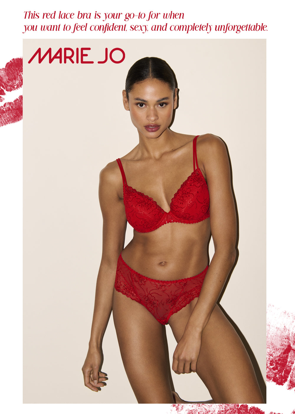 Model wearing Marie Jo red lace lingerie set with plunge bra and embroidered briefs, confident and feminine lingerie style.