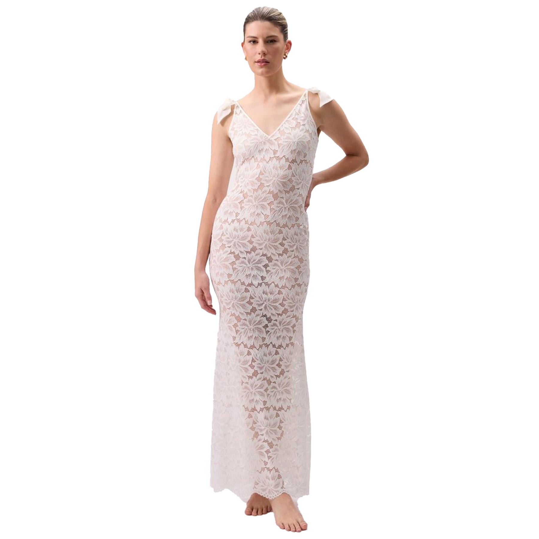 Front view of ivory floral lace maxi dress with V-neckline, bow shoulder straps, and scalloped hem