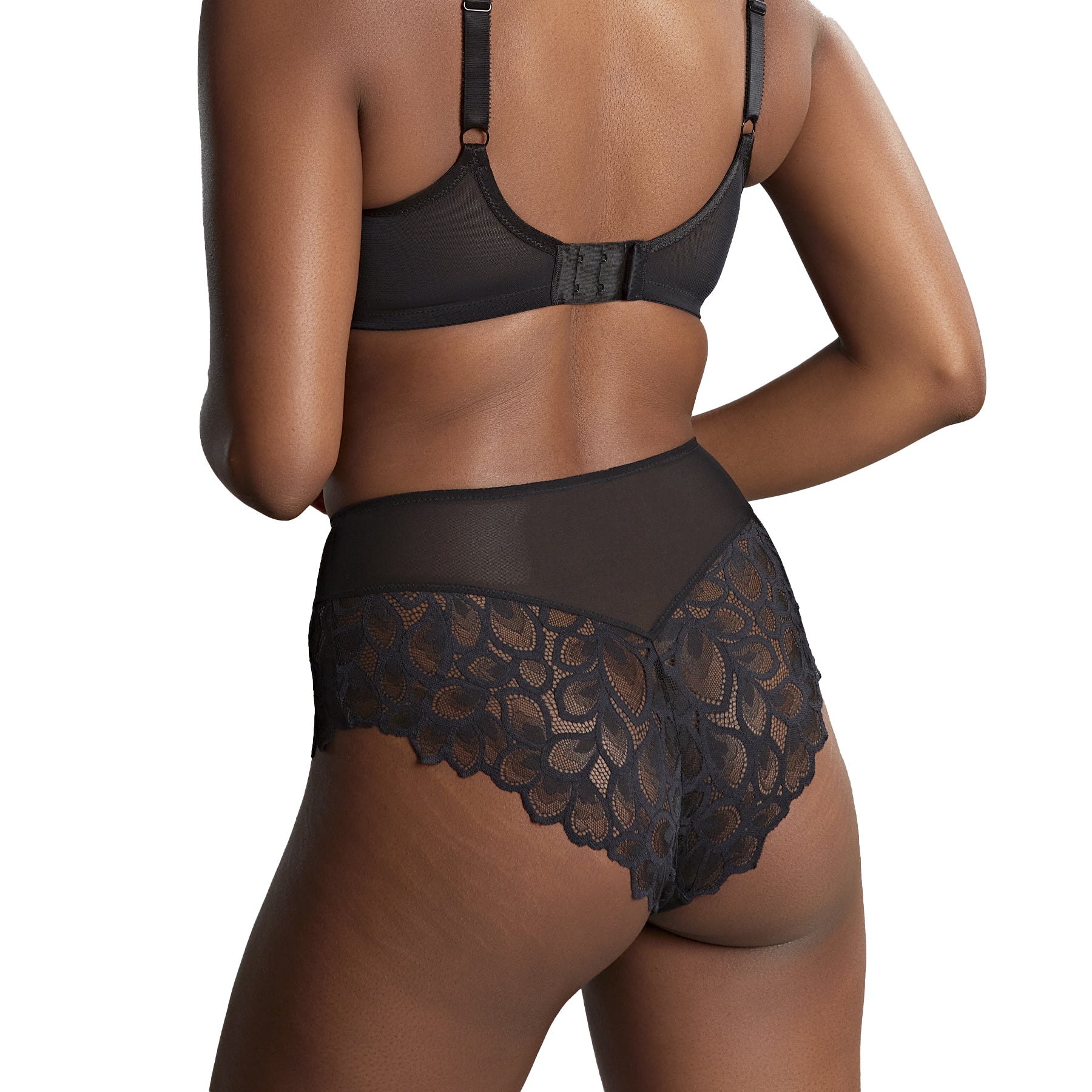Back view of black lace shorty brief showing sheer mesh panel and scalloped lace detail.