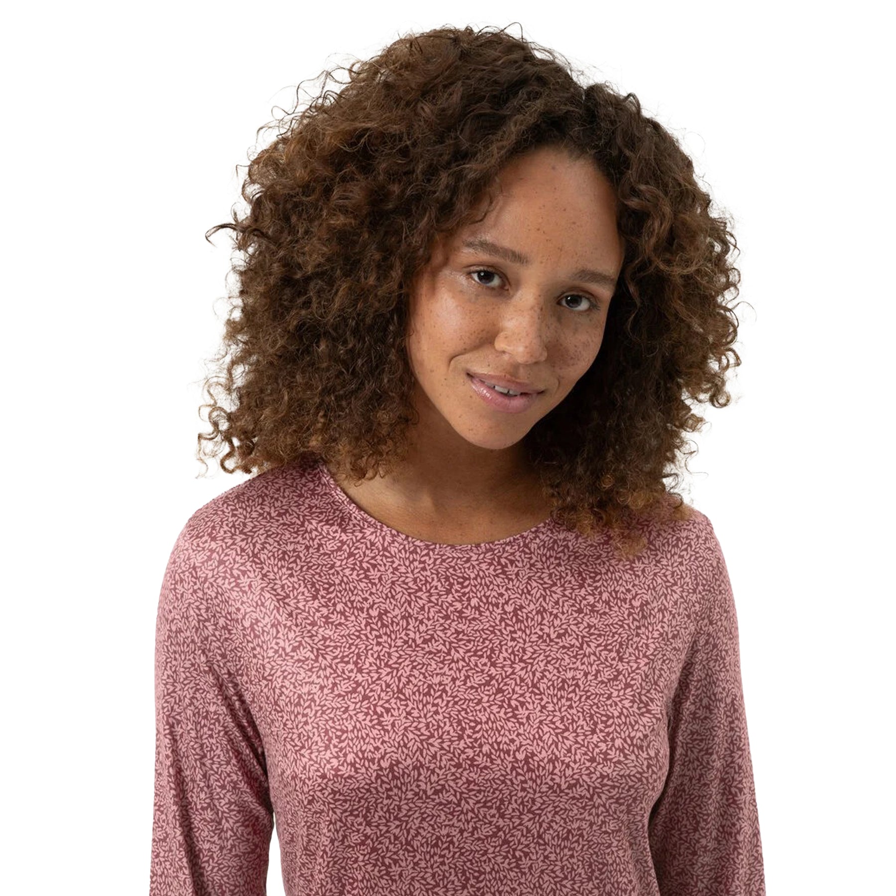 Close-up of neckline and print detail on rose-pink cotton nightgown.