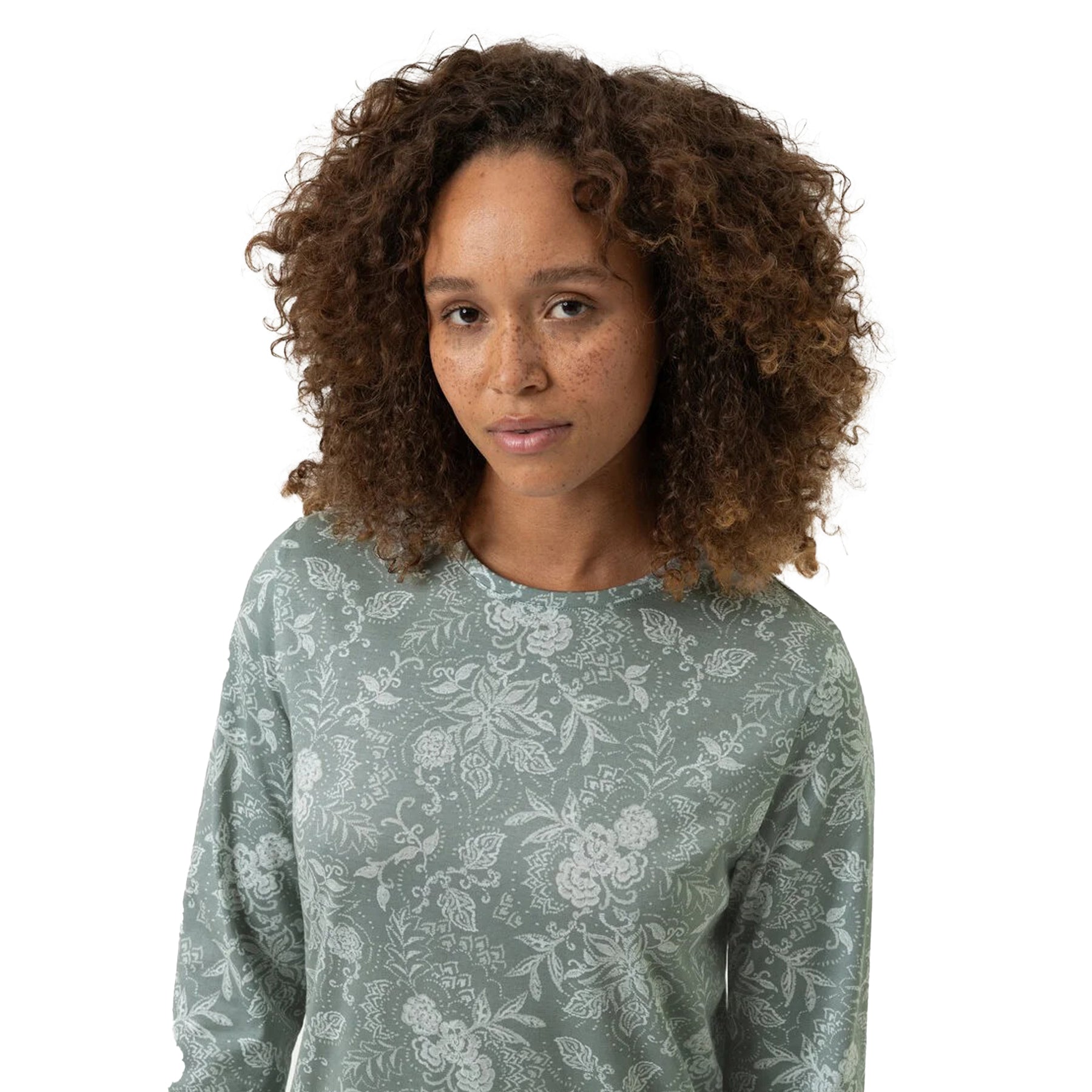 Close-up of sage green floral cotton nightshirt showing neckline and pattern details.