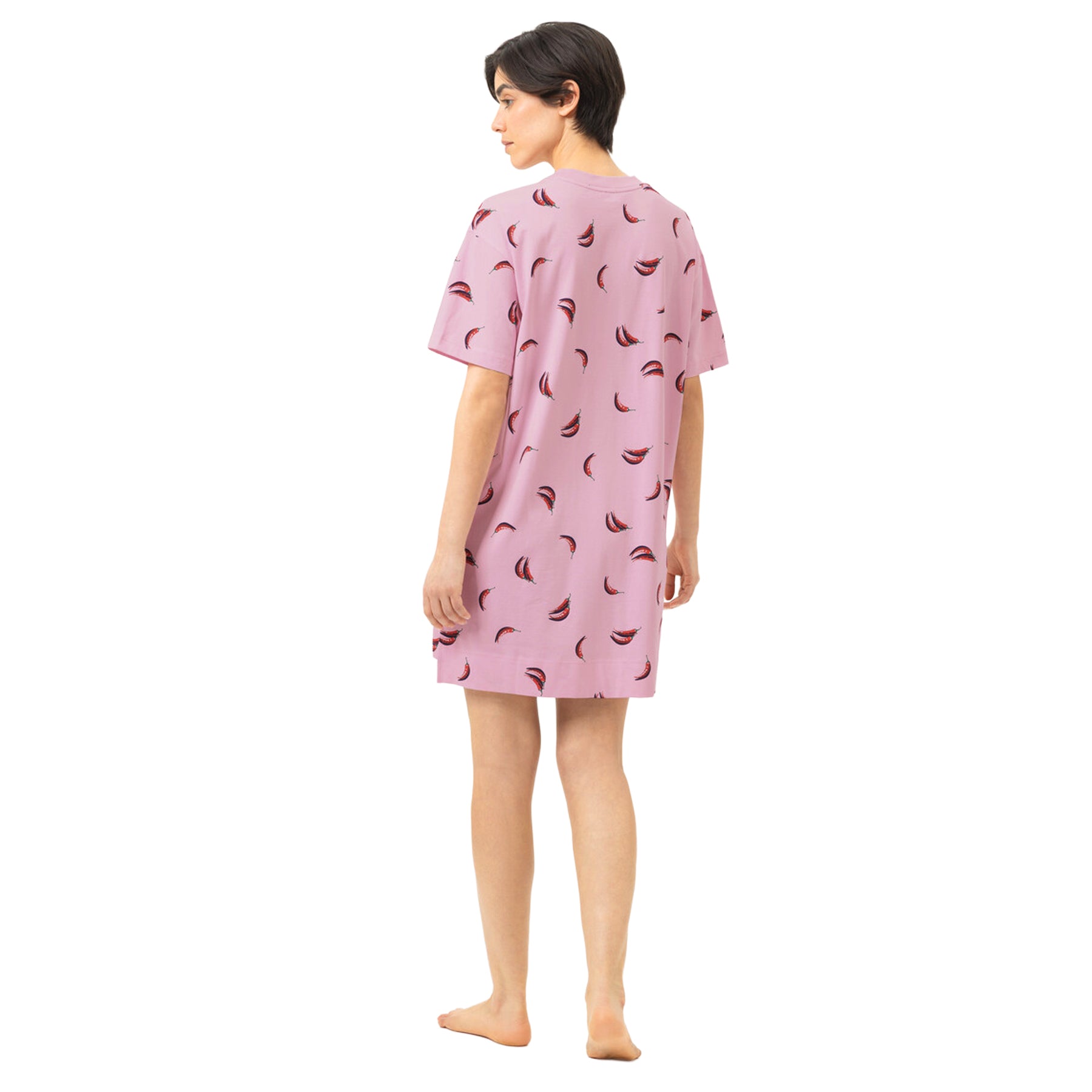 Back view of pink chili pepper print sleep shirt featuring short sleeves, a relaxed silhouette and above-the-knee length.