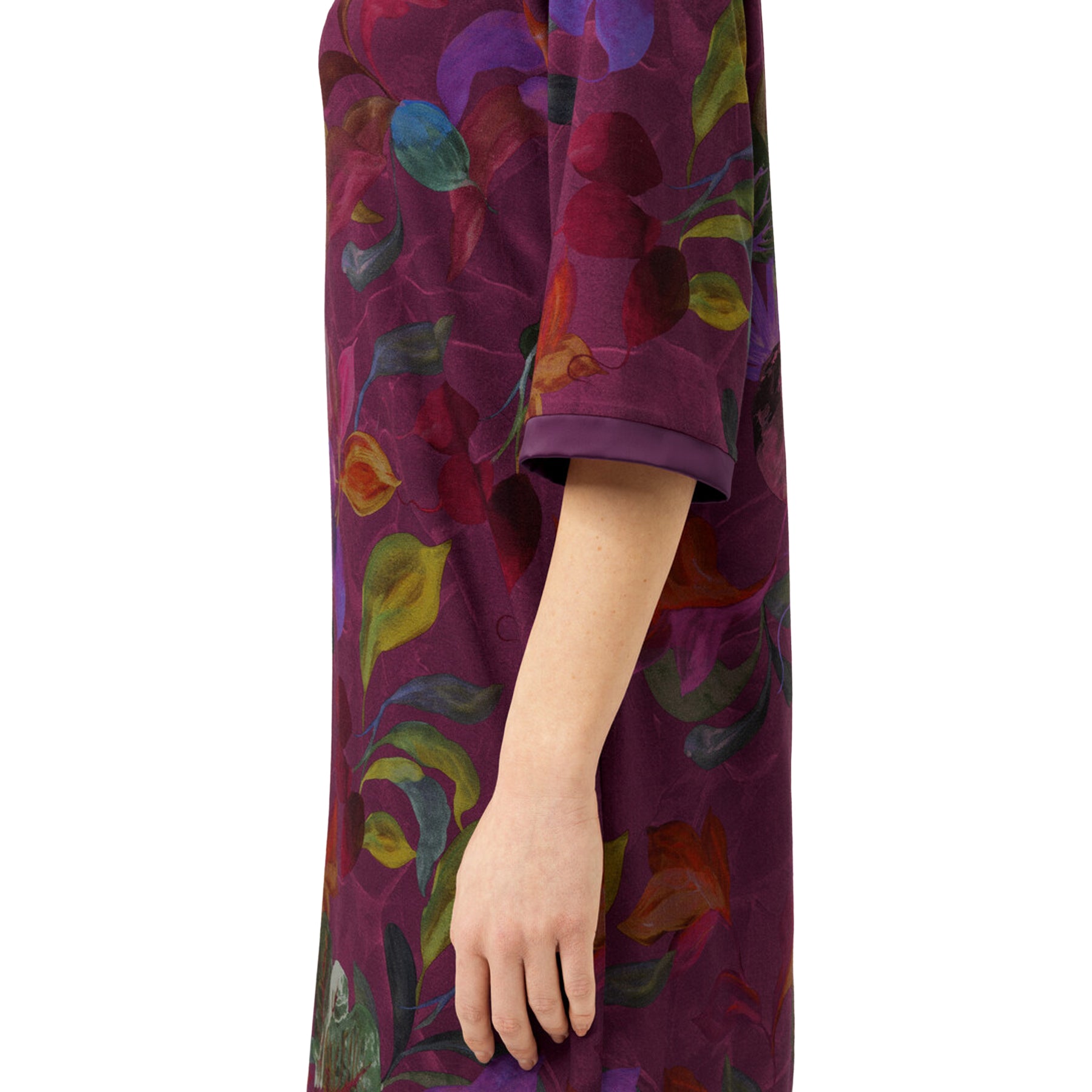 Close-up of the Mey Crushed Berry sleepshirt highlighting the vibrant berry botanical print, soft fabric, and three-quarter sleeve with folded cuff detail.