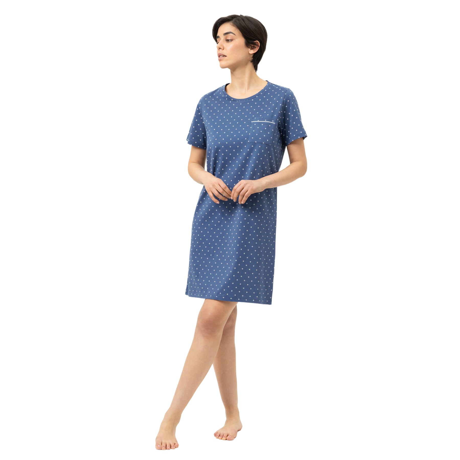 Mey Midnight Dust short sleeve sleepshirt in blue with delicate white geometric print and chest pocket detail, front view on model.