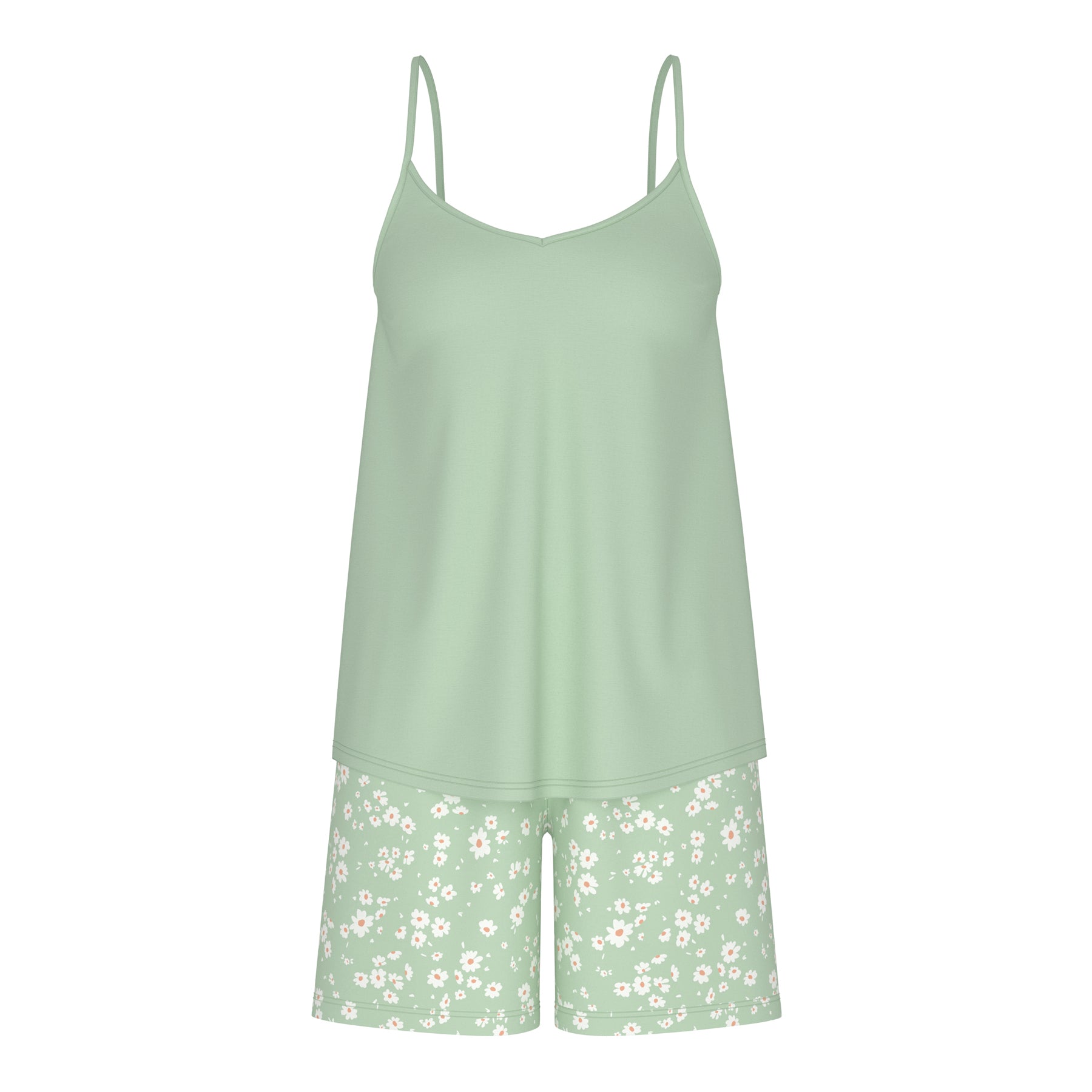 Light green slip dress with floral shorts on a white background