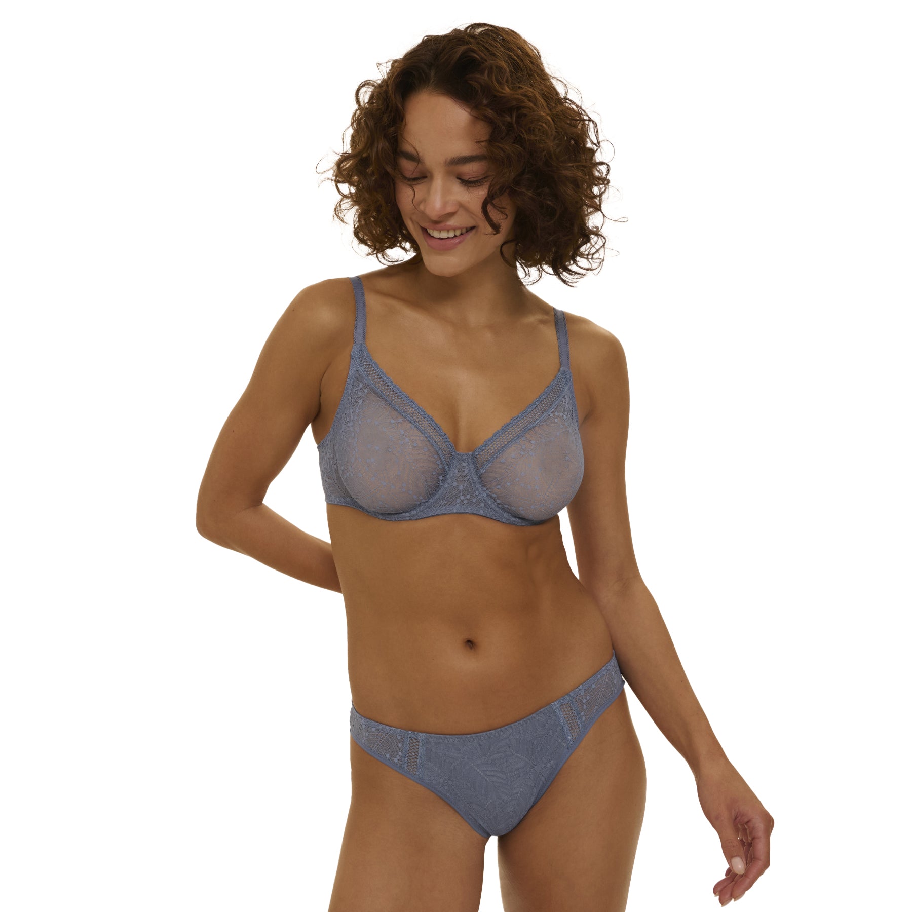 Model wearing 12S324 lace underwire bra in Chambray Blue with matching lace brief, front view.
