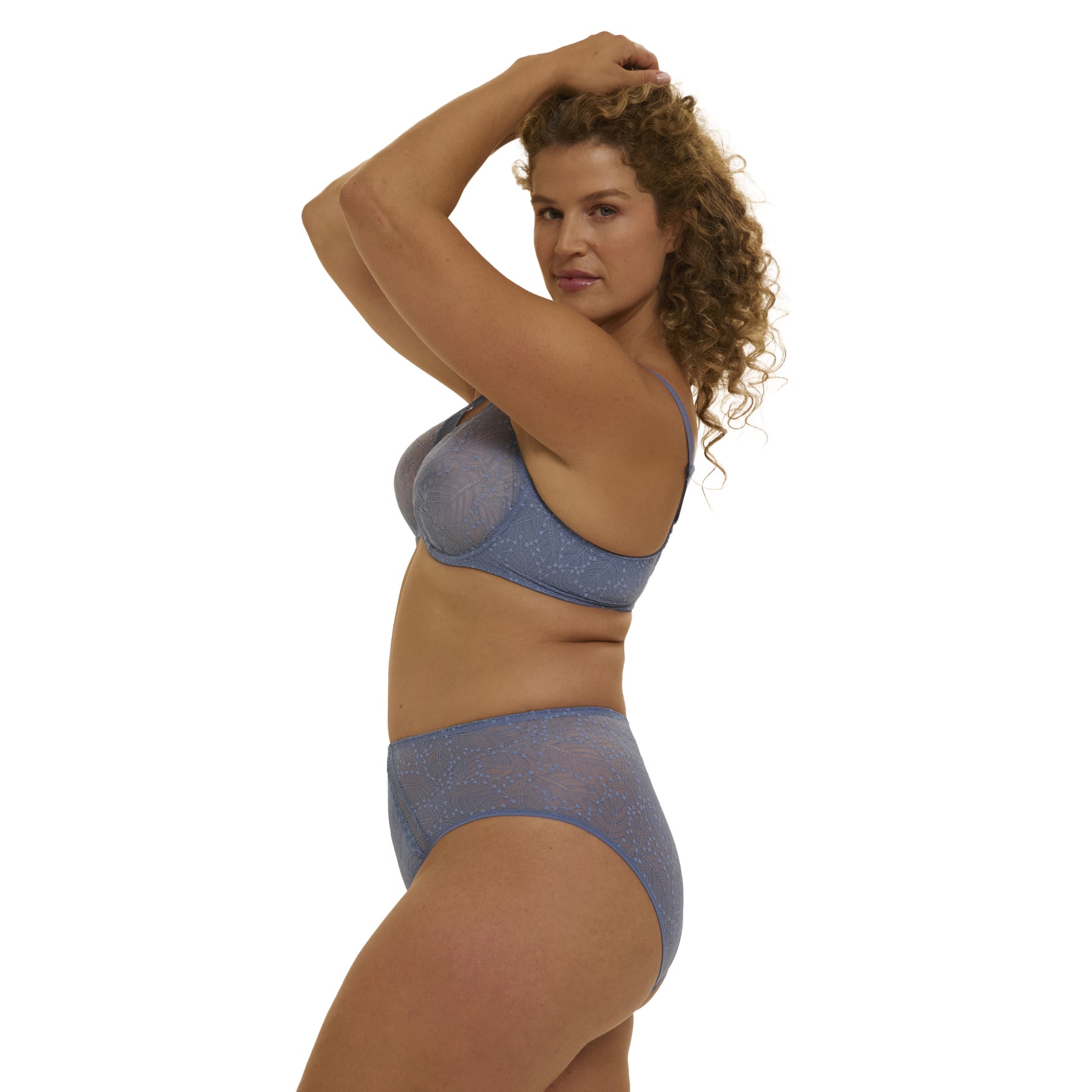 Side view of chambray blue lace brief with full coverage fit and delicate floral lace detailing.
