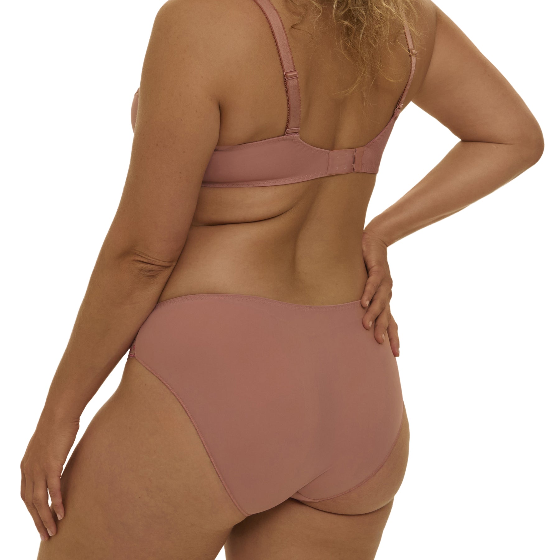 Back view of pink full brief with smooth fabric finish and comfortable coverage, shown on model.