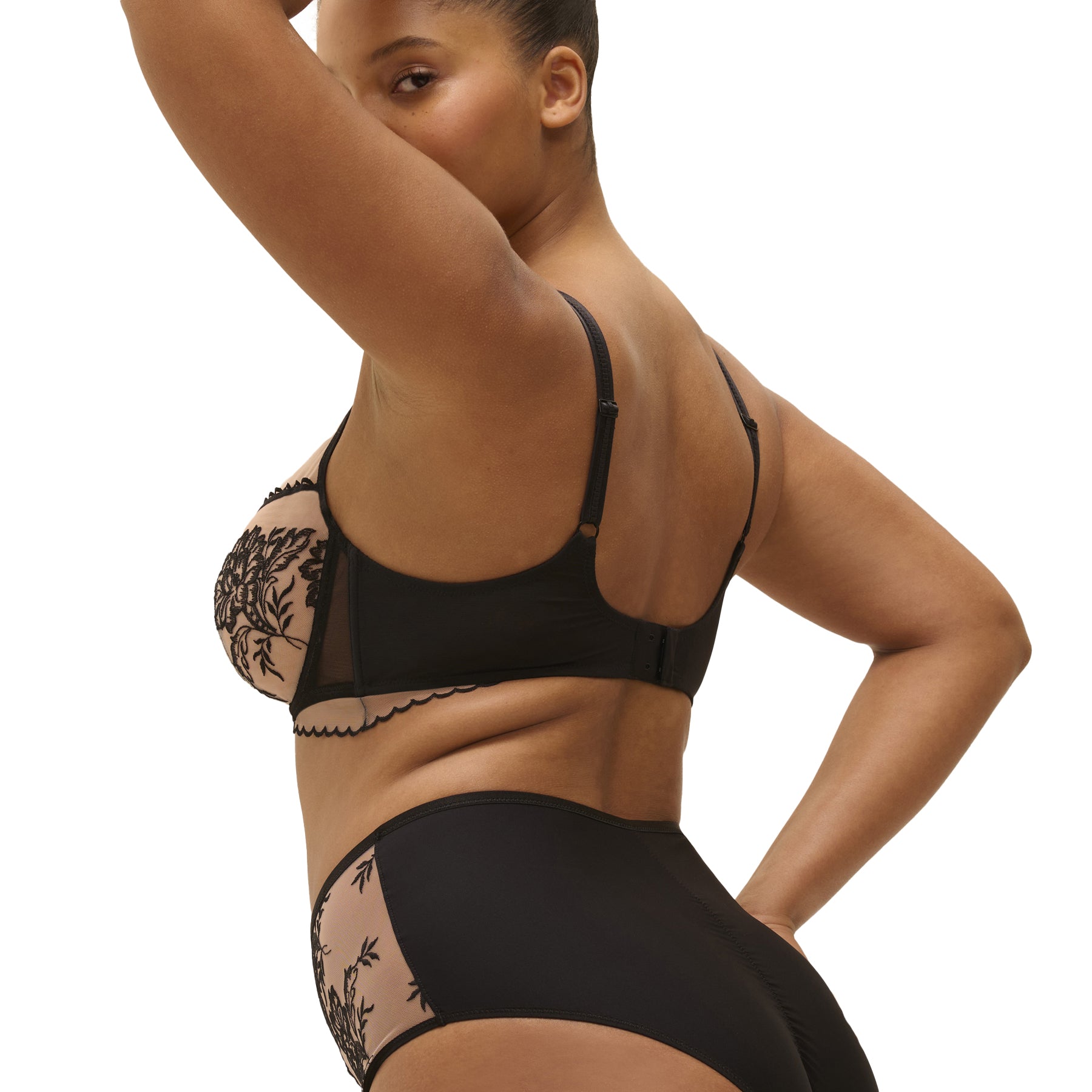 Black sheer bra with floral embroidery, side and back view on plus-size model.