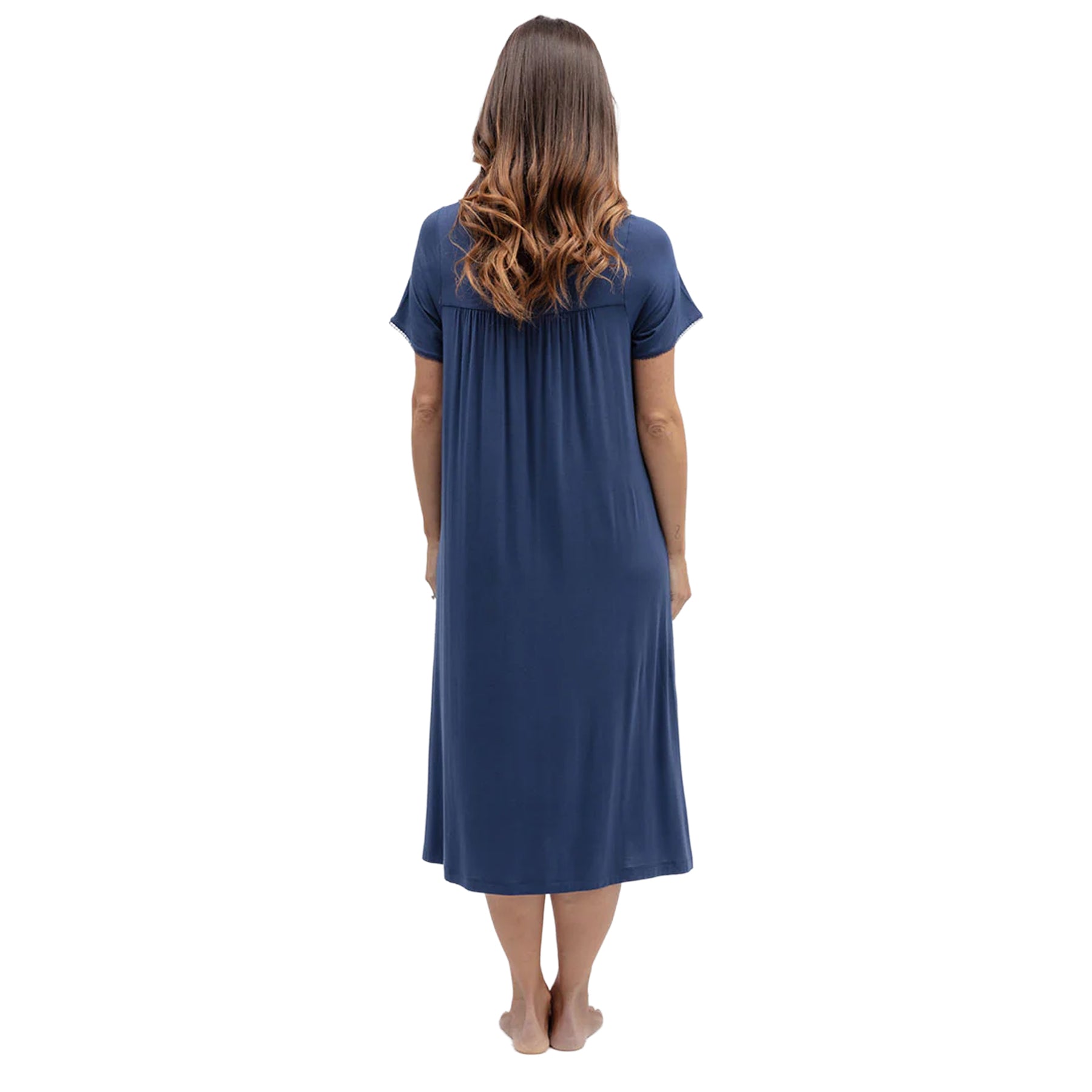 Back view of navy blue sleep gown showcasing relaxed draping fabric, short sleeves and comfortable loose fit.