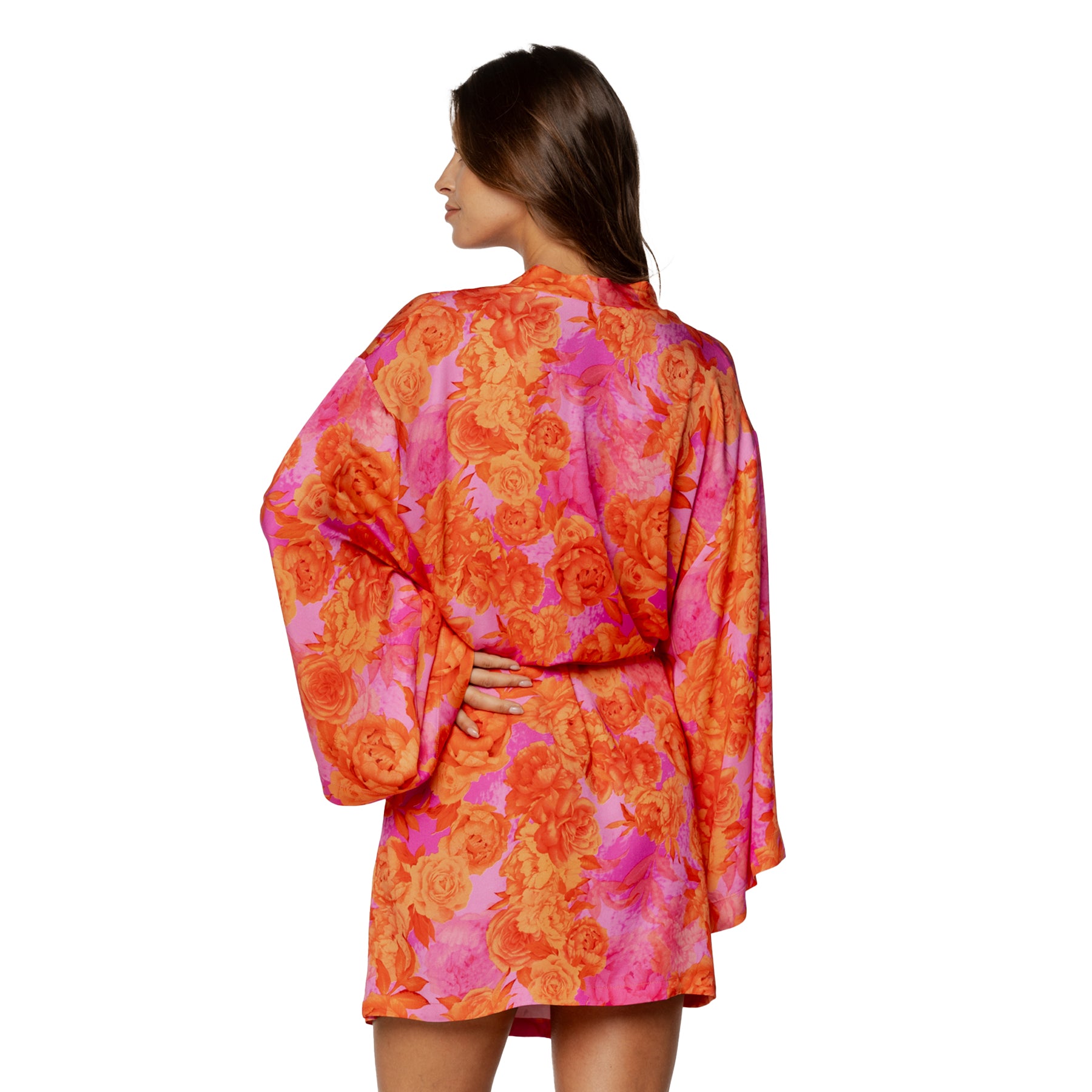 Pink and orange floral robe with wide sleeves, back view on model