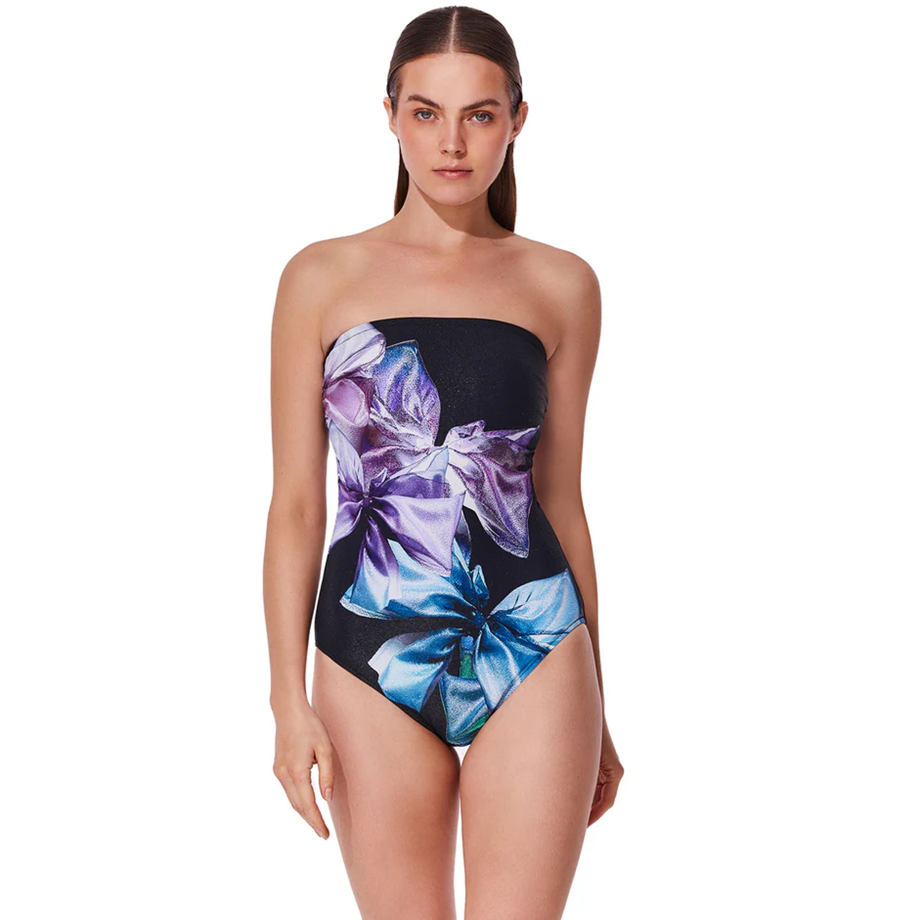 Black strapless one-piece swimsuit with large purple and blue floral print, front view on model.