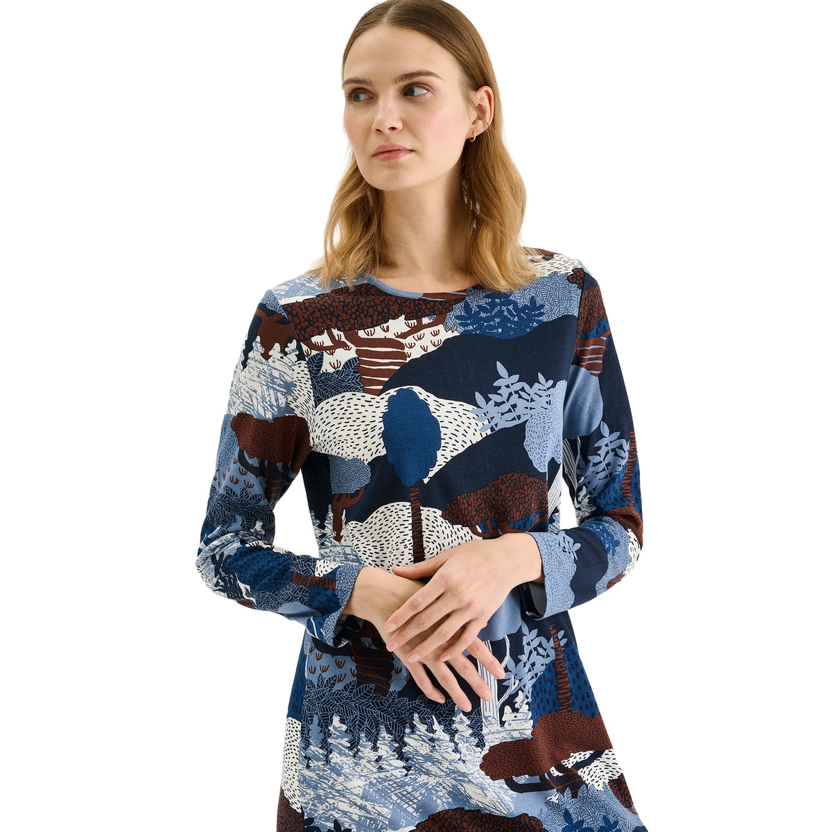 Close-up of Nanso nightgown featuring an artistic woodland print in navy, blue, white and brown