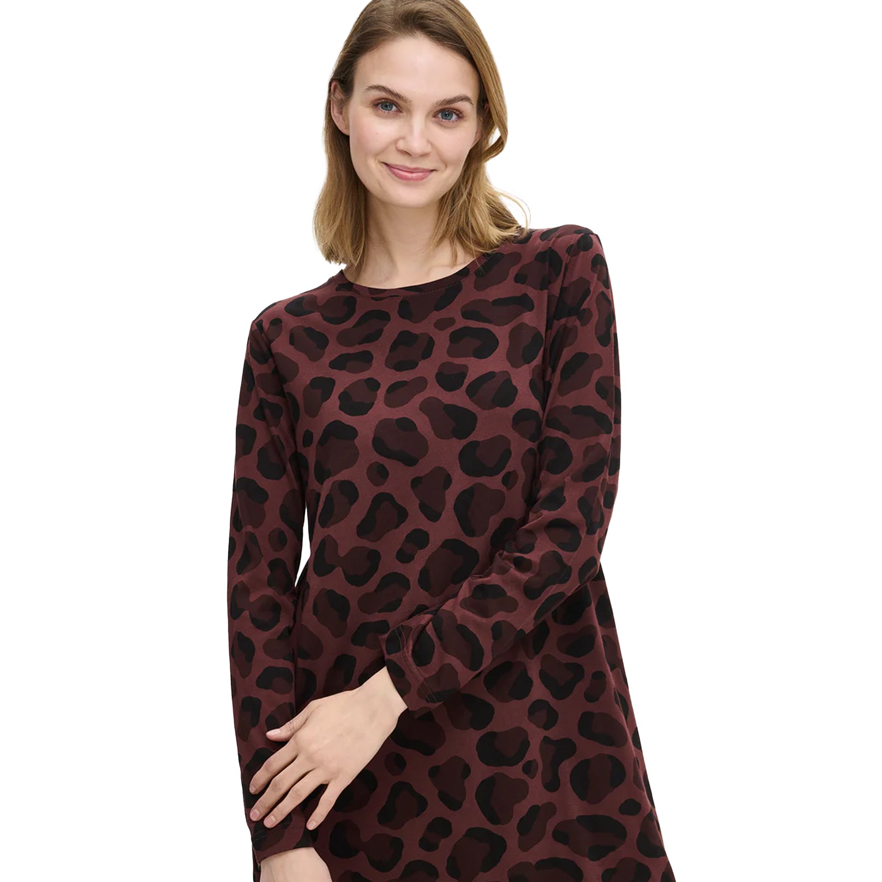 Woman wearing a burgundy leopard-print chemise, showing the round neckline and soft cotton fabric detail.