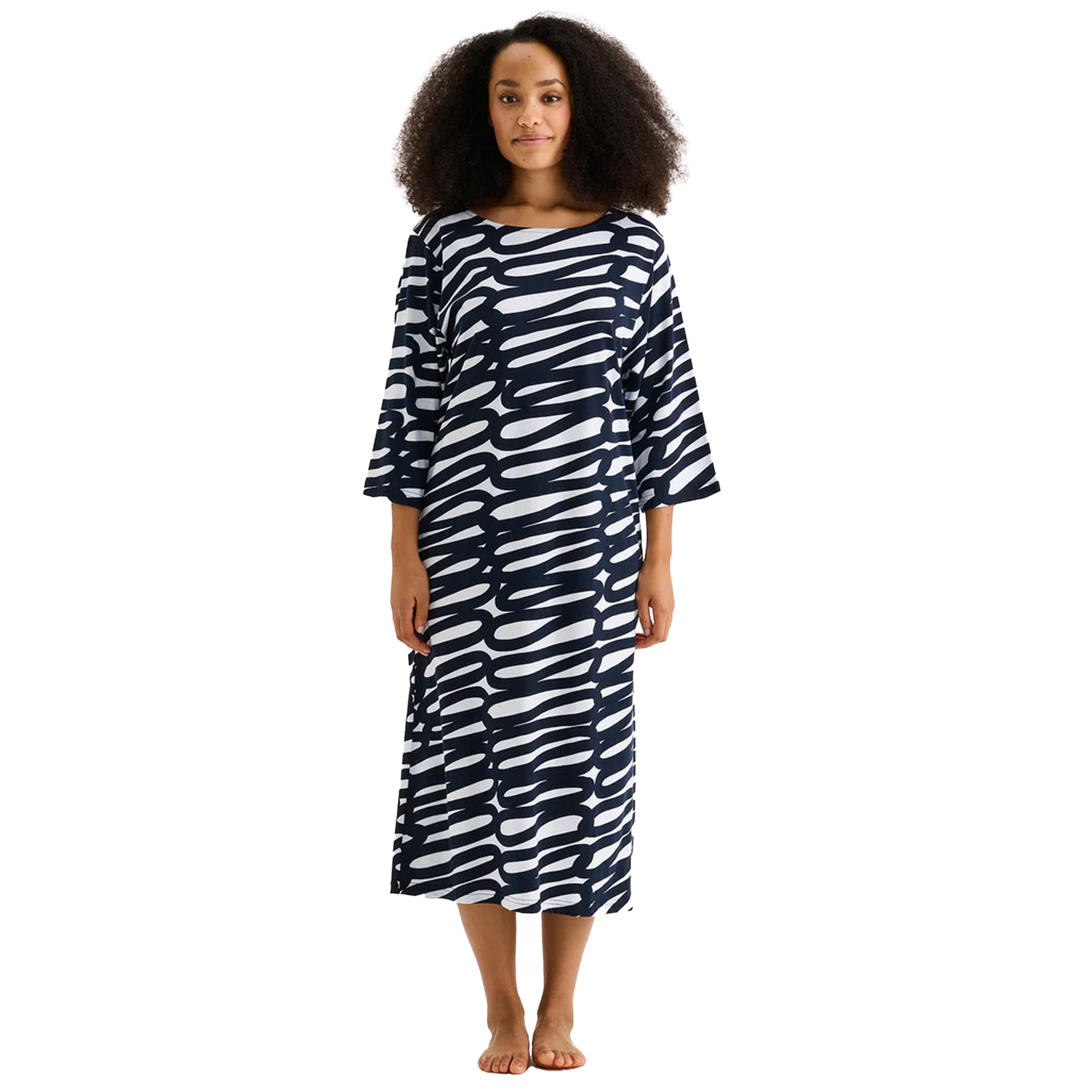 Woman wearing a navy and white abstract print midi nightgown with three-quarter sleeves, relaxed fit, and round neckline.