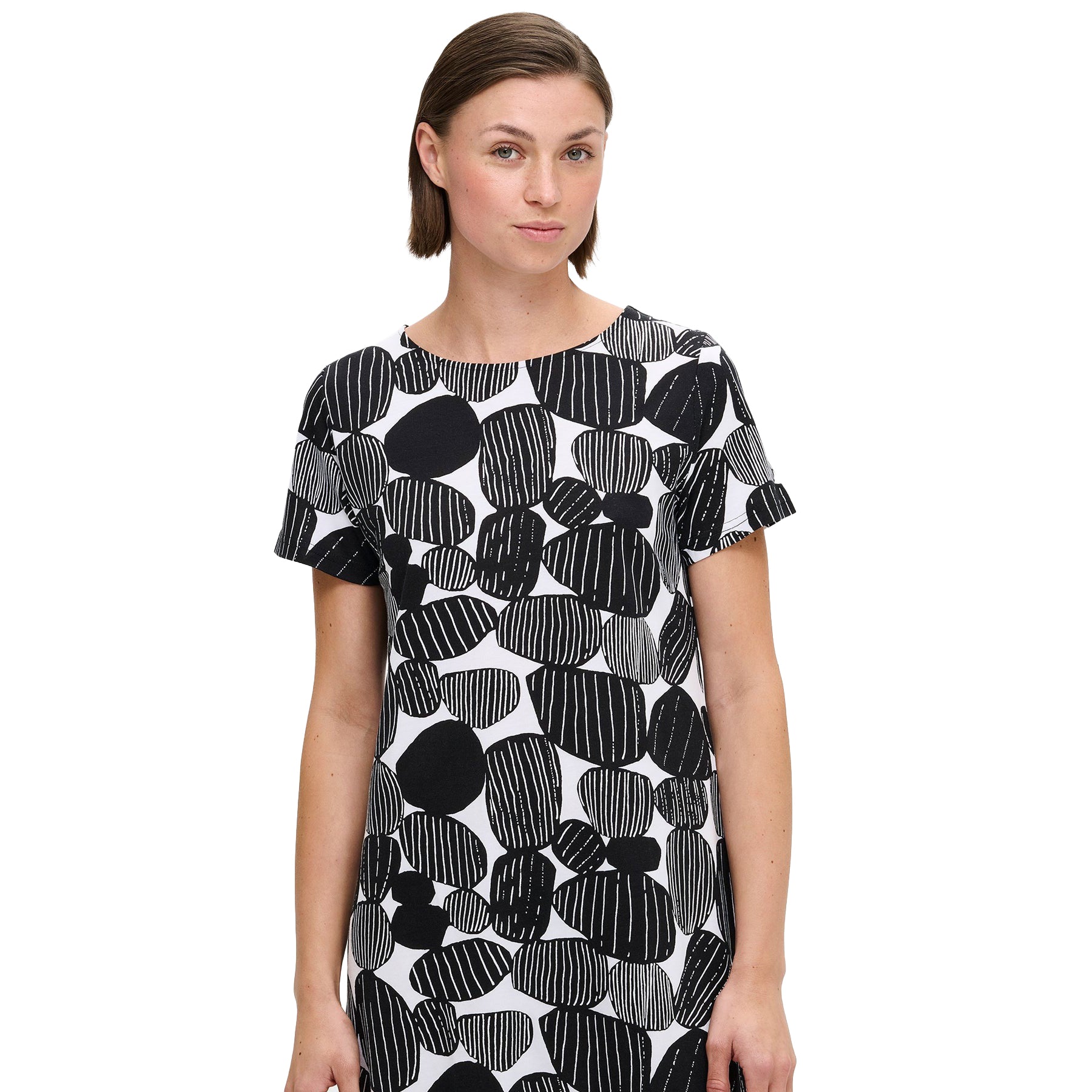 Close-up of black and white short-sleeve nightdress featuring an abstract stone pattern and round neckline, shown on model.