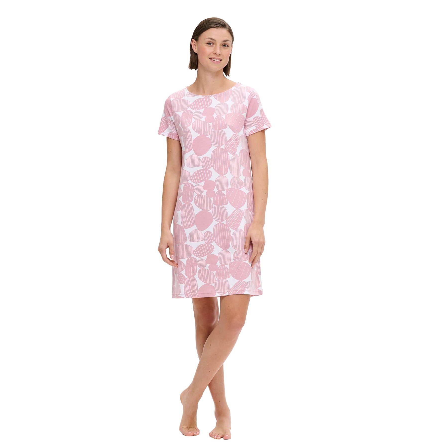 Pink and white short-sleeve nightdress with abstract stone print, knee-length silhouette, shown on model standing barefoot against a white background.