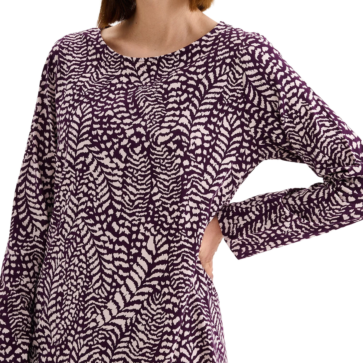 Close-up of Nanso Fiona Chemise showing purple and beige abstract print, round neckline and long sleeves