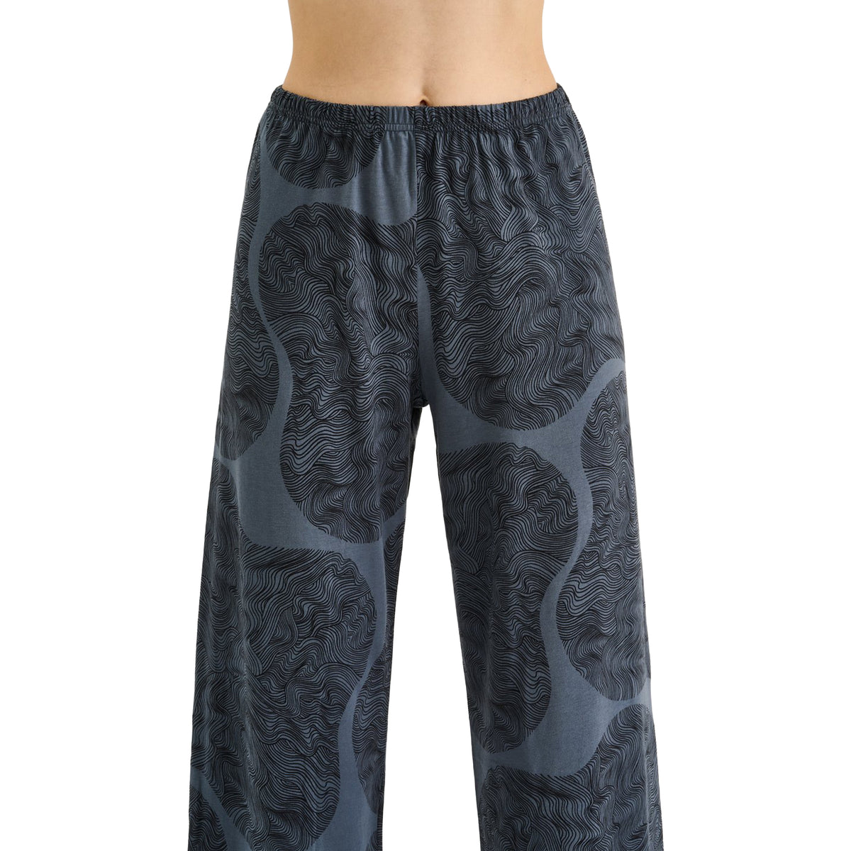 Close-up of Nanso Paasi pajama pants in dark grey abstract wave print with comfortable elastic waistband