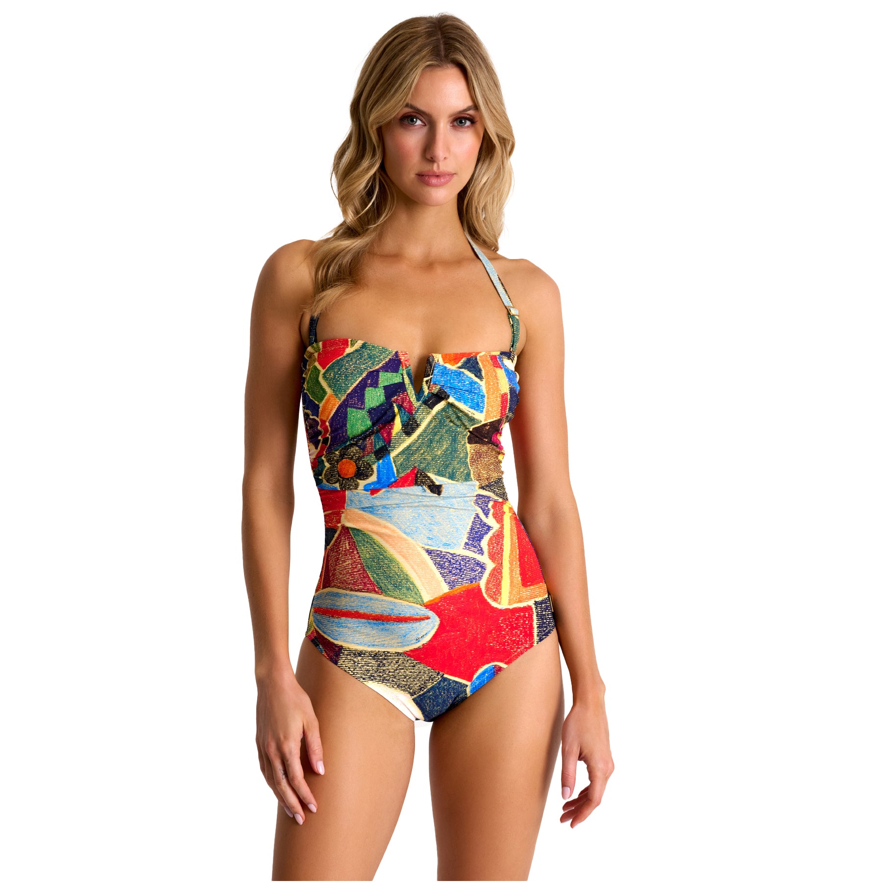 Woman wearing a colorful one-piece swimsuit on a white background