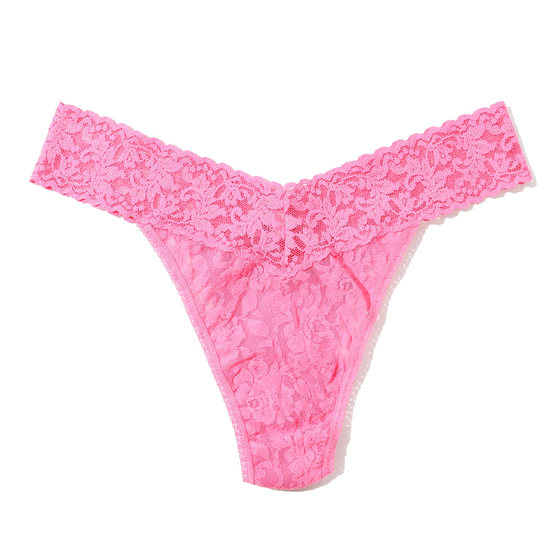 Flat lay of pink lace thong with scalloped waistband and floral lace detailing.
