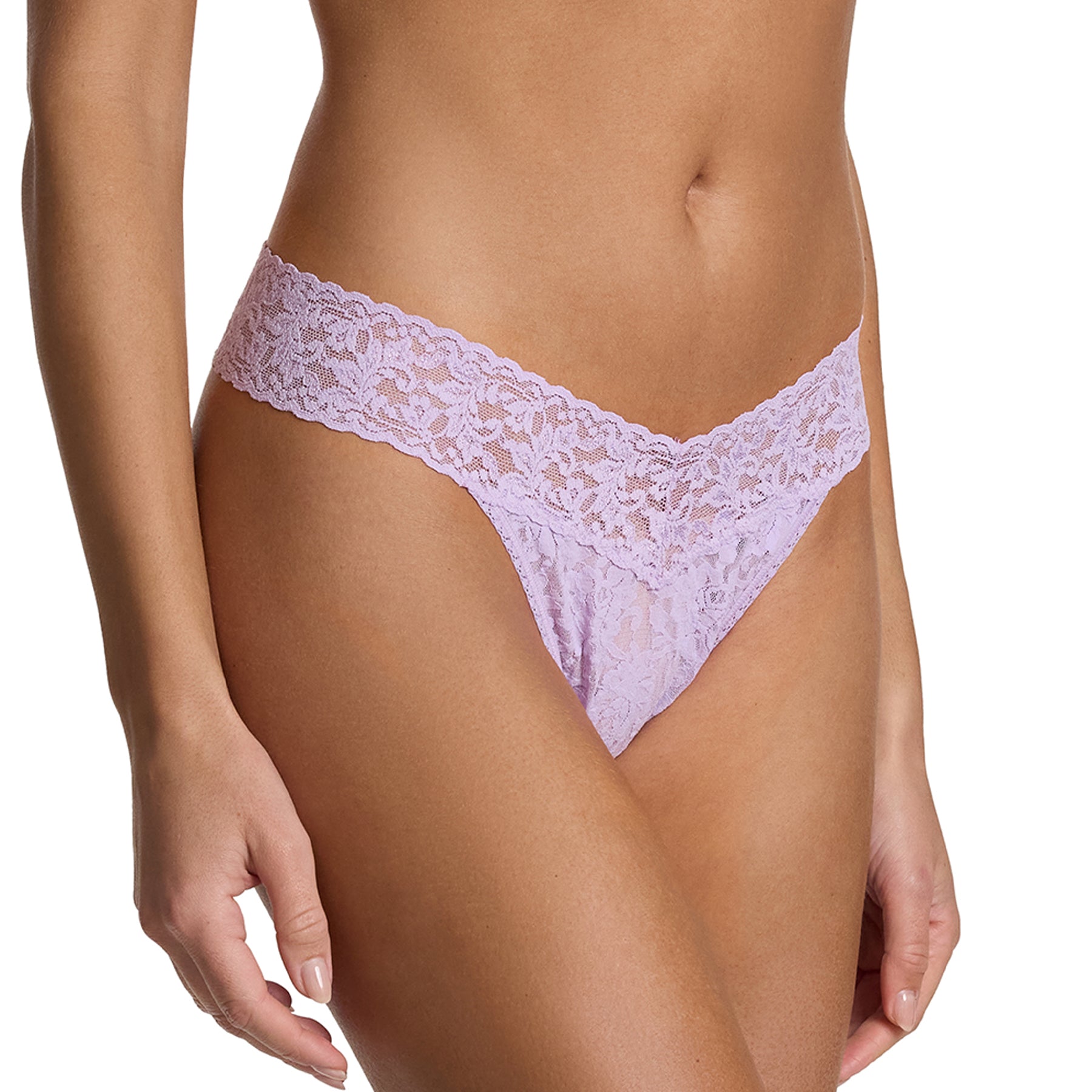 Side front view of woman in lavender lace thong with soft floral lace waistband.