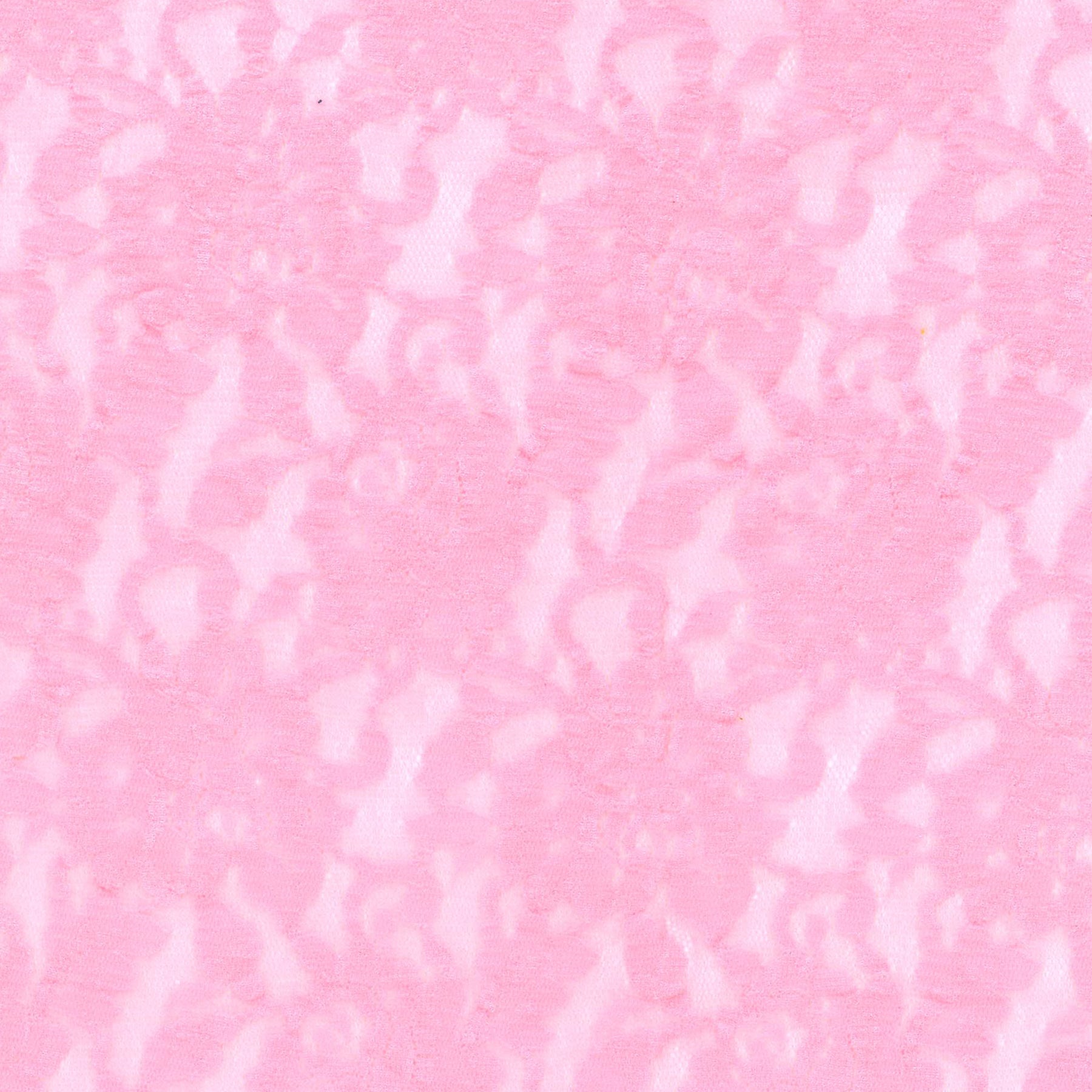 Close-up of pink floral lace fabric with soft stretch texture