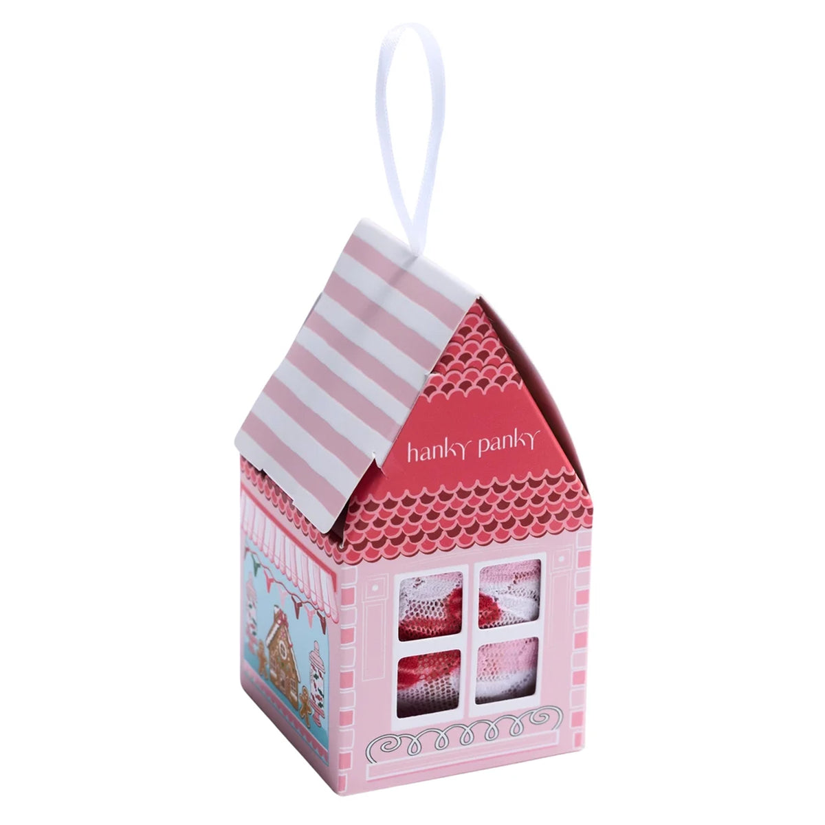 Hanky Panky Signature Lace Original Rise Thong Sugar and Spice holiday gift box, designed as a pink gingerbread house with a striped roof, decorative windows, festive illustrations, and a white hanging ribbon.