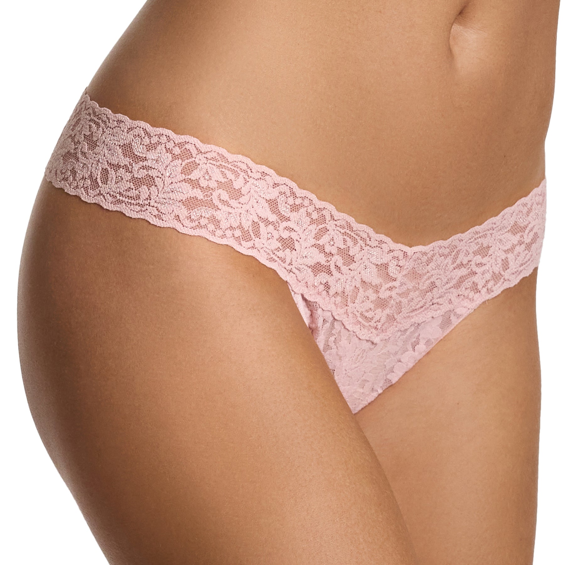 Pink lace thong on a white background