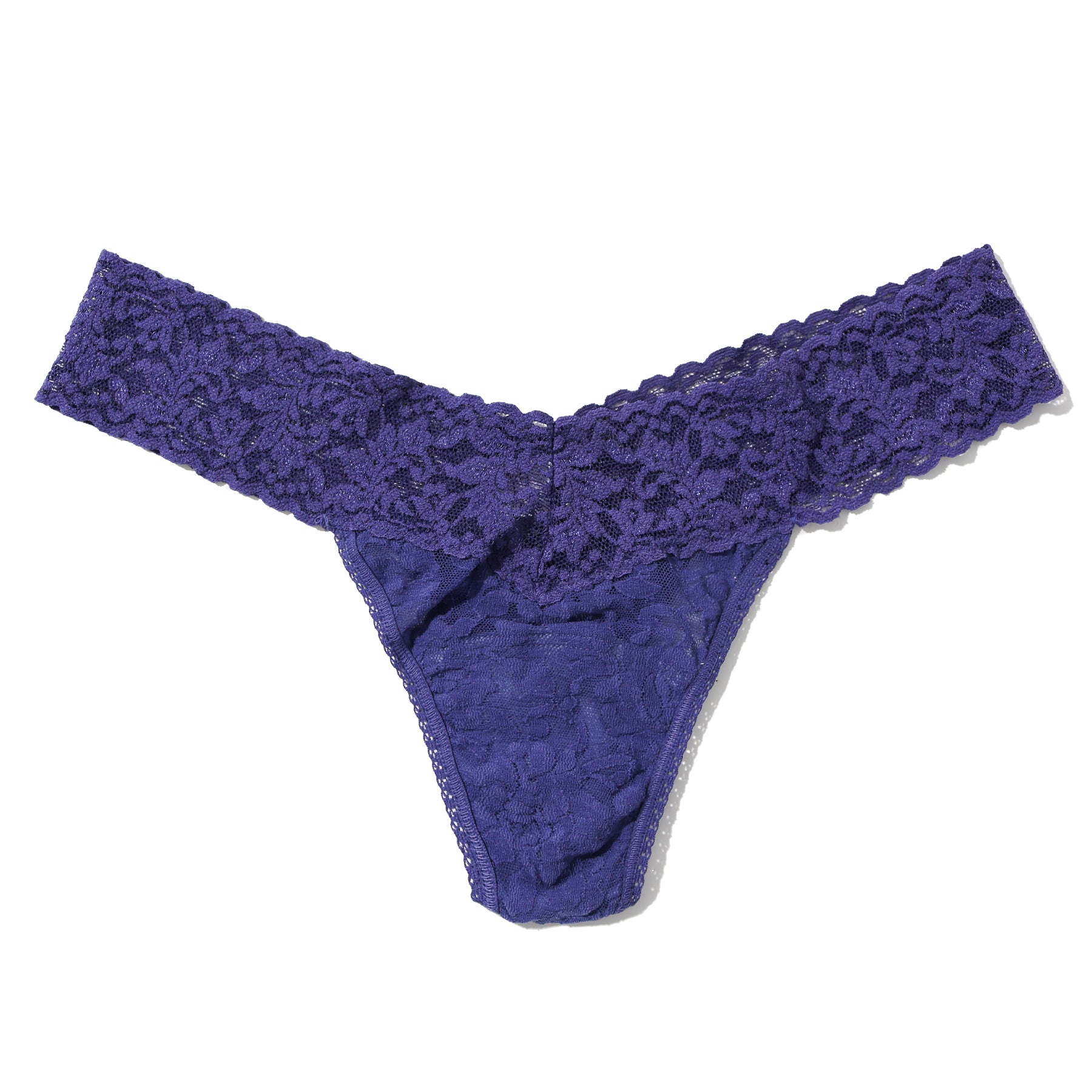 Purple lace thong with wide floral lace waistband and sheer lace body, flat lay product image.