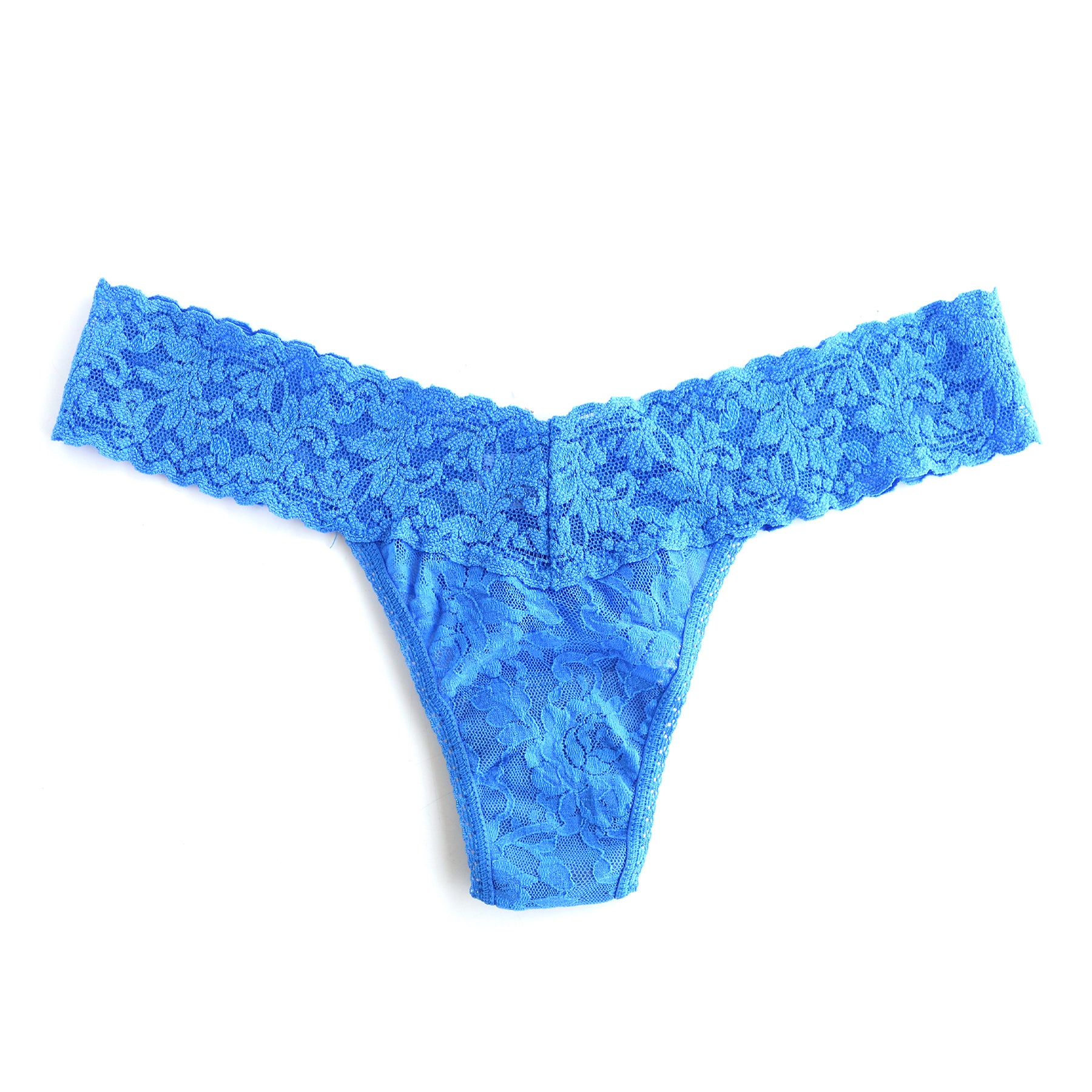 Bright blue floral lace thong underwear flat lay on white background with wide stretch lace waistband.