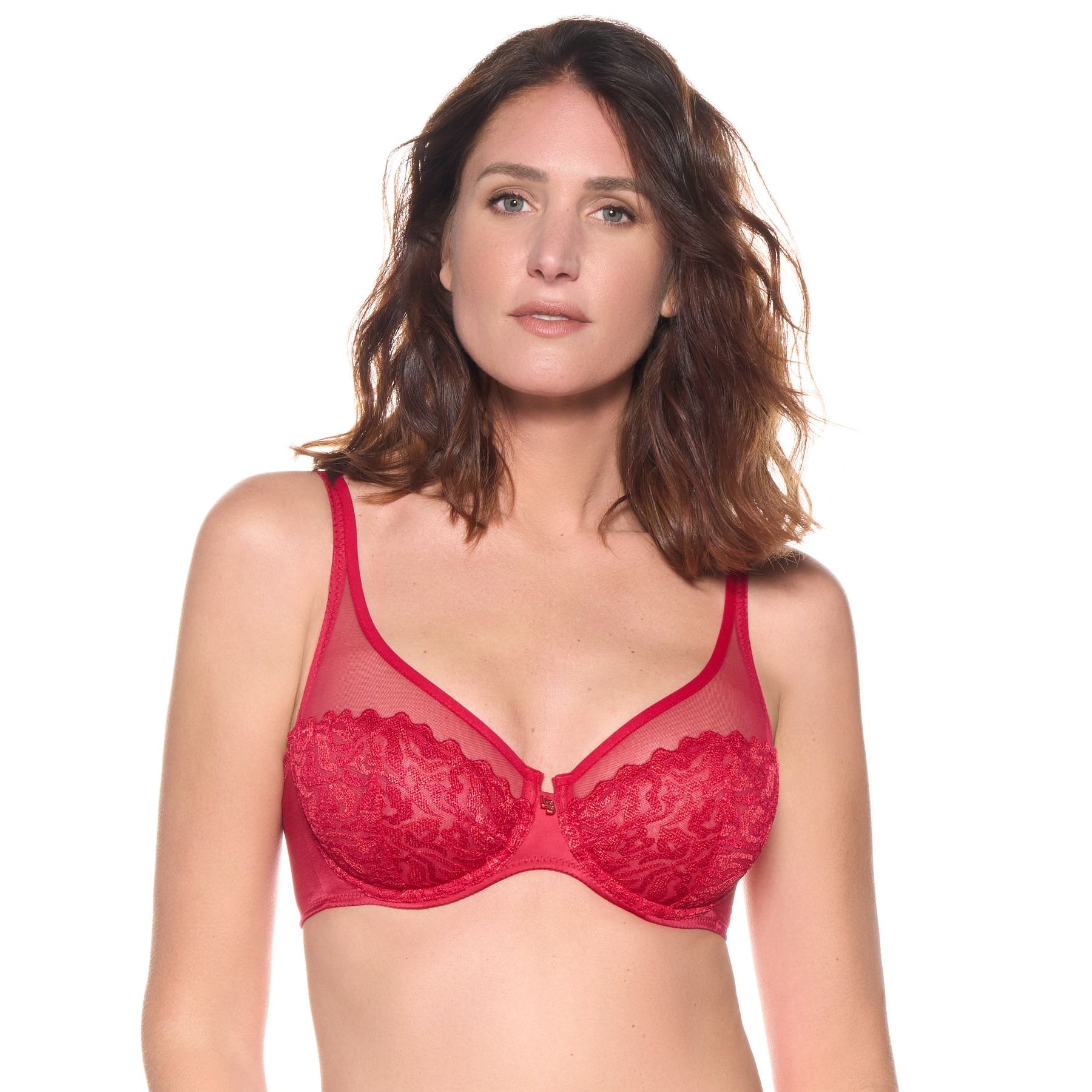 Model wearing the Louisa Bracq Waves Plunge Bra in red, featuring sheer mesh and embroidered underwire cups.