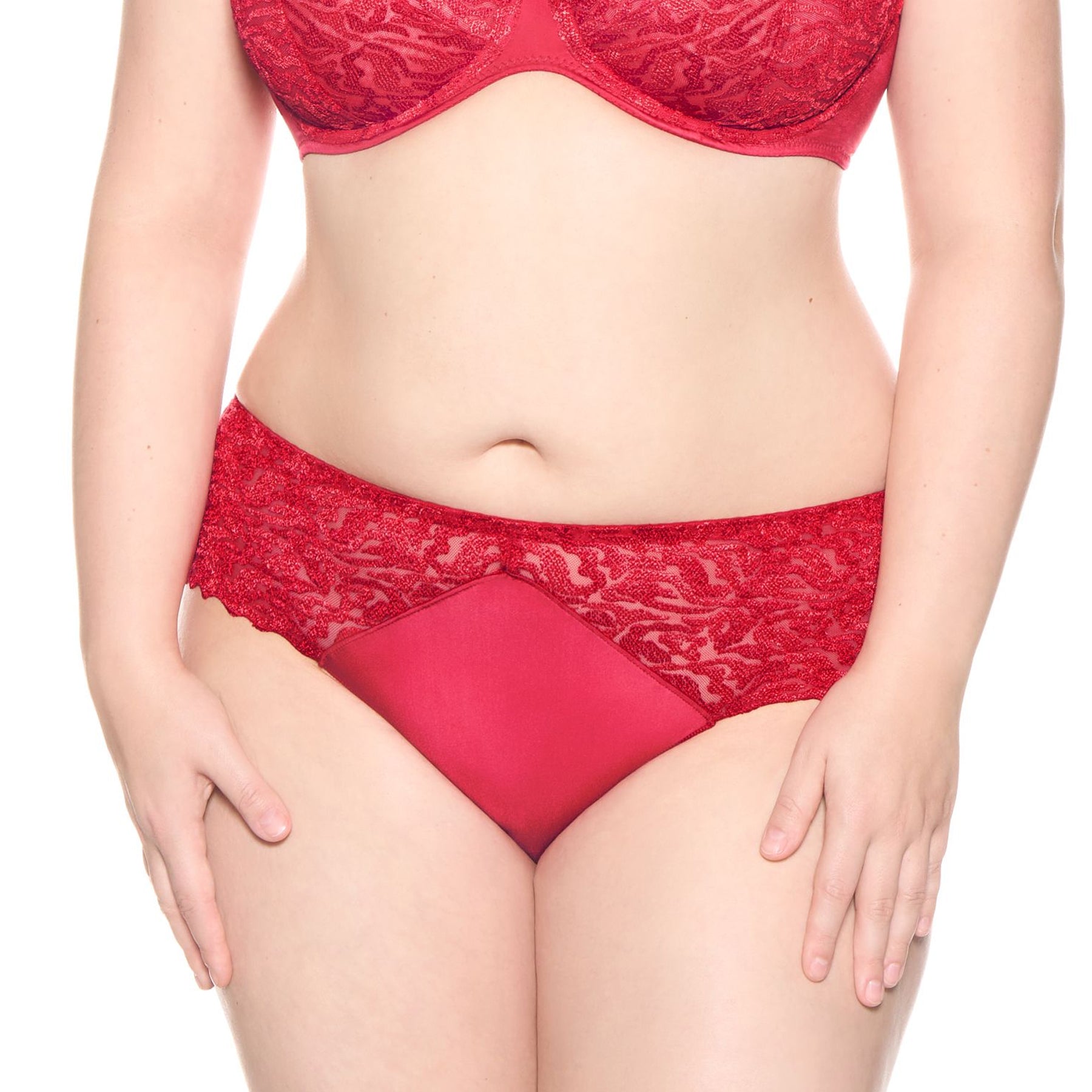 Front view of model wearing Louisa Bracq Waves briefs in red, featuring embroidered lace and a smooth centre panel.