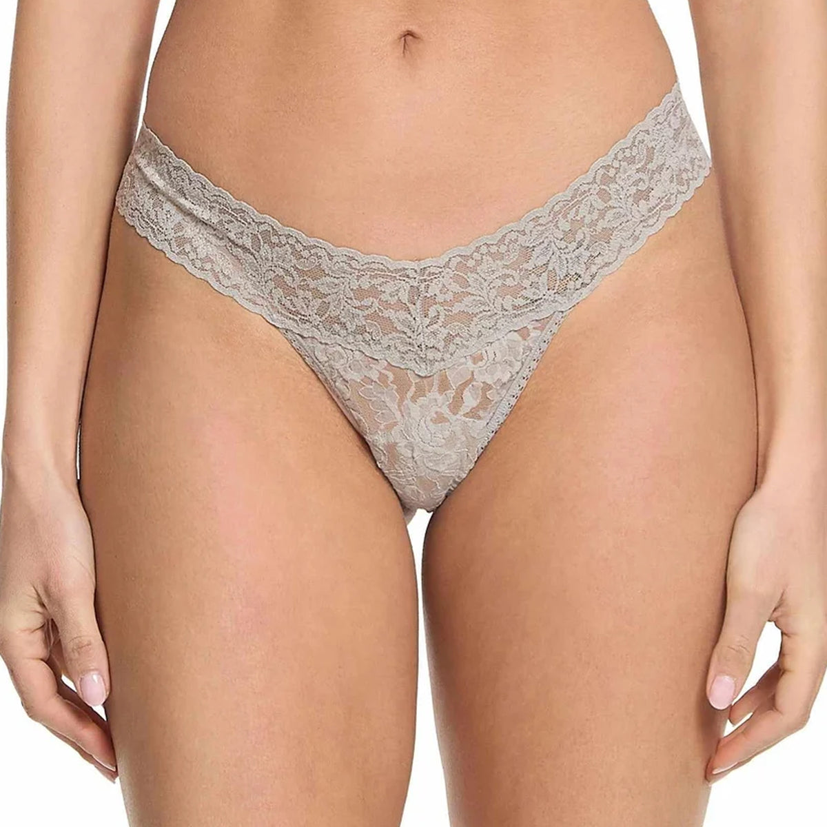 Front view of the Hanky Panky Signature Lace Low Rise Thong in Grey, featuring delicate sheer floral lace, a wide V-shaped scalloped waistband, and high-cut leg openings.