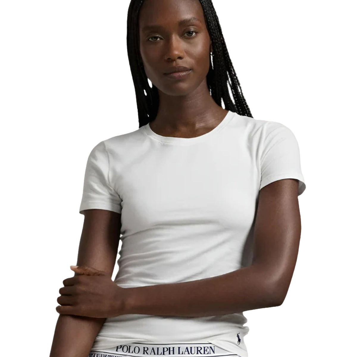 Model wearing a classic white Polo Ralph Lauren crew-neck T-shirt with short sleeves and a fitted silhouette.