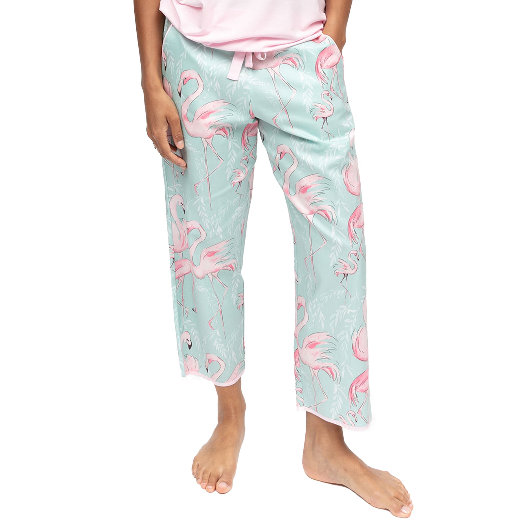 Close-up of mint flamingo print pyjama pants with drawstring waist and relaxed fit
