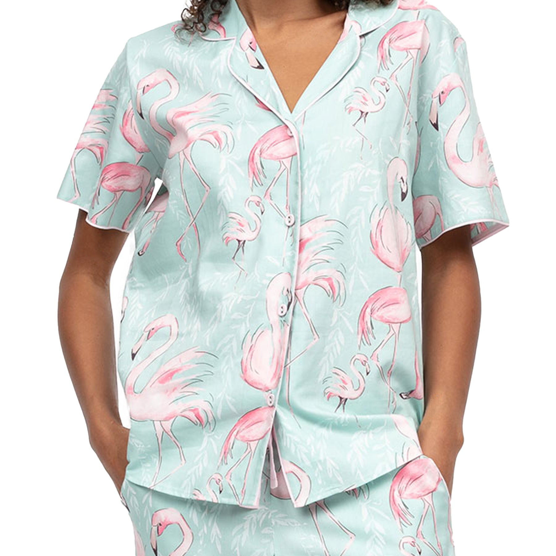 Close-up of mint flamingo print pyjama top with short sleeves, collar and button-front detail