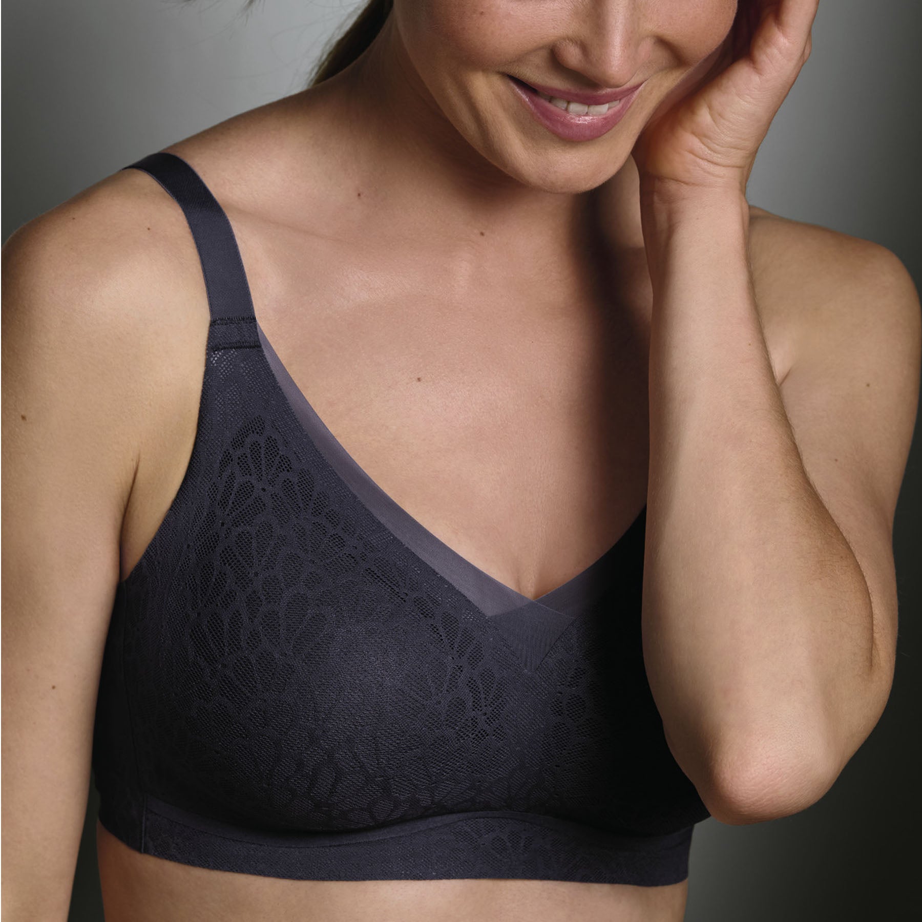 Model wearing a Shadow Blue wireless lace bra with molded seamless cups, wide comfort straps, and a smooth V-neckline for everyday support.