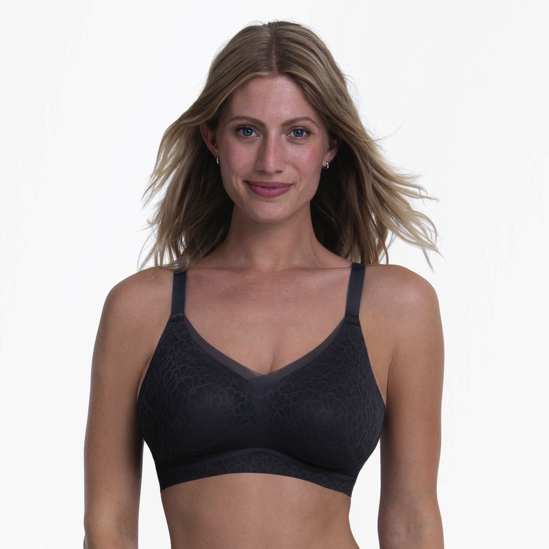 Model wearing a Shadow Blue wireless bra with seamless molded cups, soft floral lace, and wire-free comfort for all-day wear.