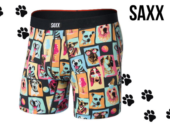 SAXX men’s boxer briefs with colourful dog print, featuring playful illustrated puppies and black waistband, fun novelty underwear style