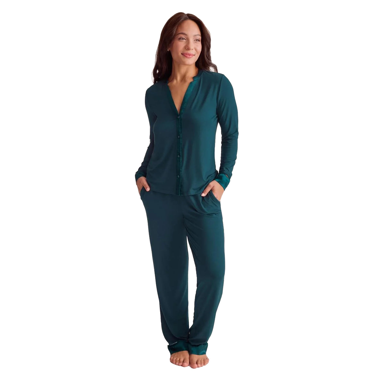 Model wearing Fleurt Deep Spruce pajama set with a long-sleeve button-front top and relaxed matching pants, front view.