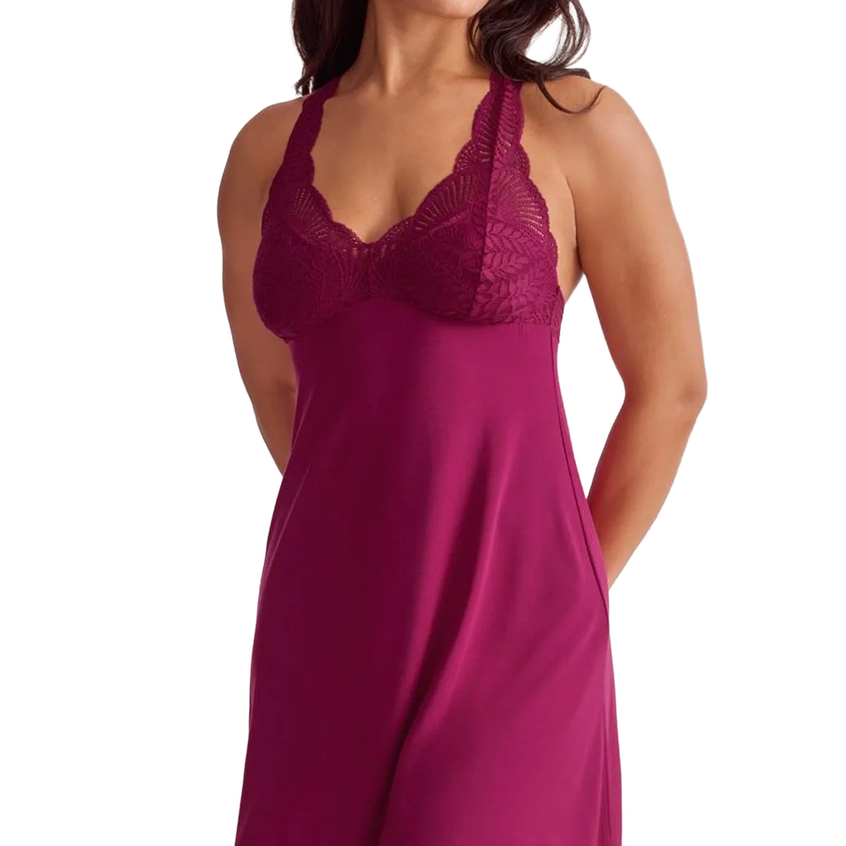 Close-up of dark cherry chemise featuring delicate floral lace cups, a scalloped V-neckline and smooth flowing fabric, front view.