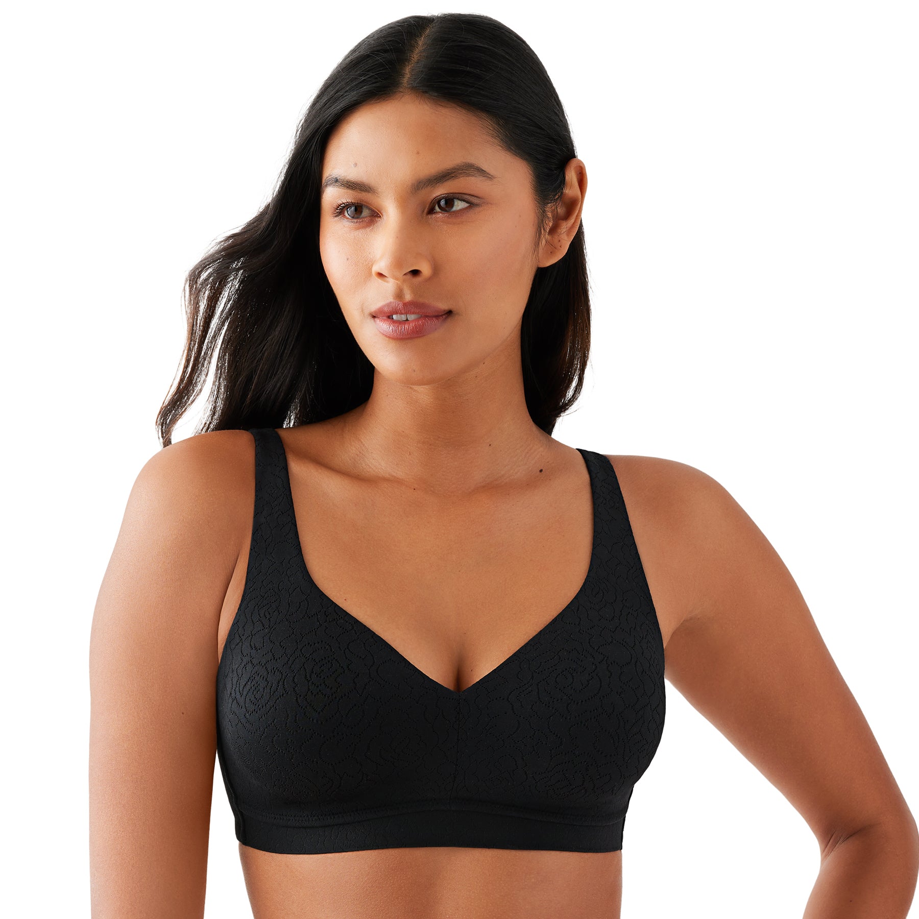 Front view of seamless black wireless bra with floral lace design and V-neckline