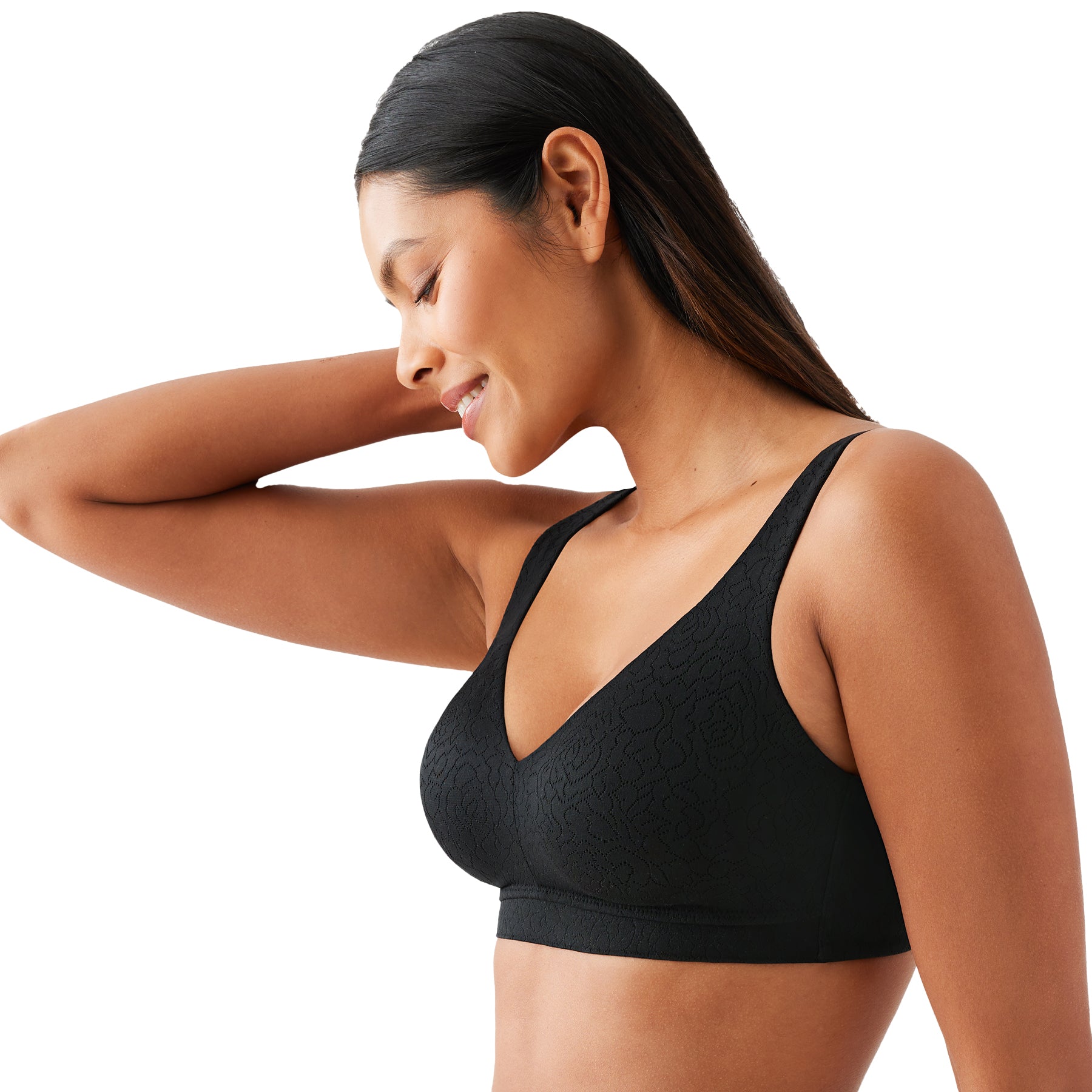 Side view of seamless black wireless bra featuring floral lace texture and soft cups