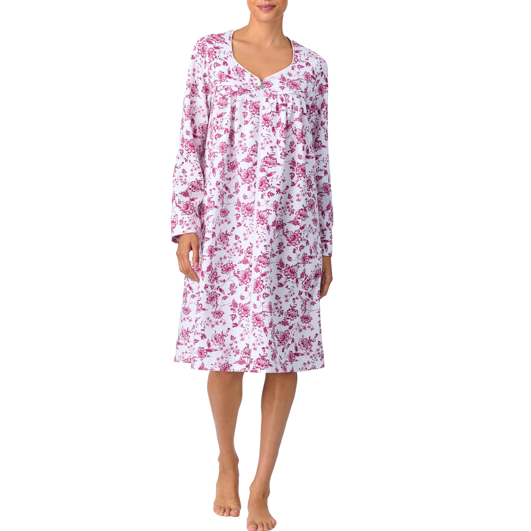 Back view of a white nightgown with pink floral print and long sleeves, made of soft cotton fabric.