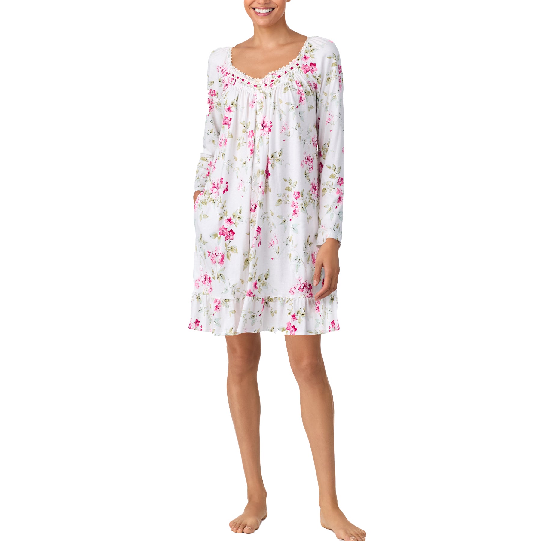 Front view of a white floral nightgown with long sleeves, lace-trim neckline, and soft pink flower print.