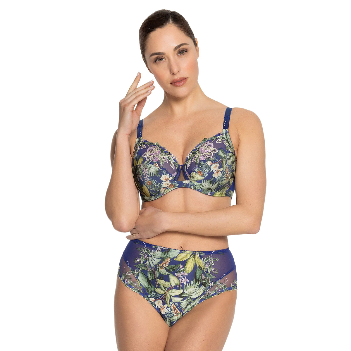 Model wearing Lise Charmel Bain de Nature high brief with a matching floral bra, showcasing the high-waisted fit and embroidered mesh side panels.