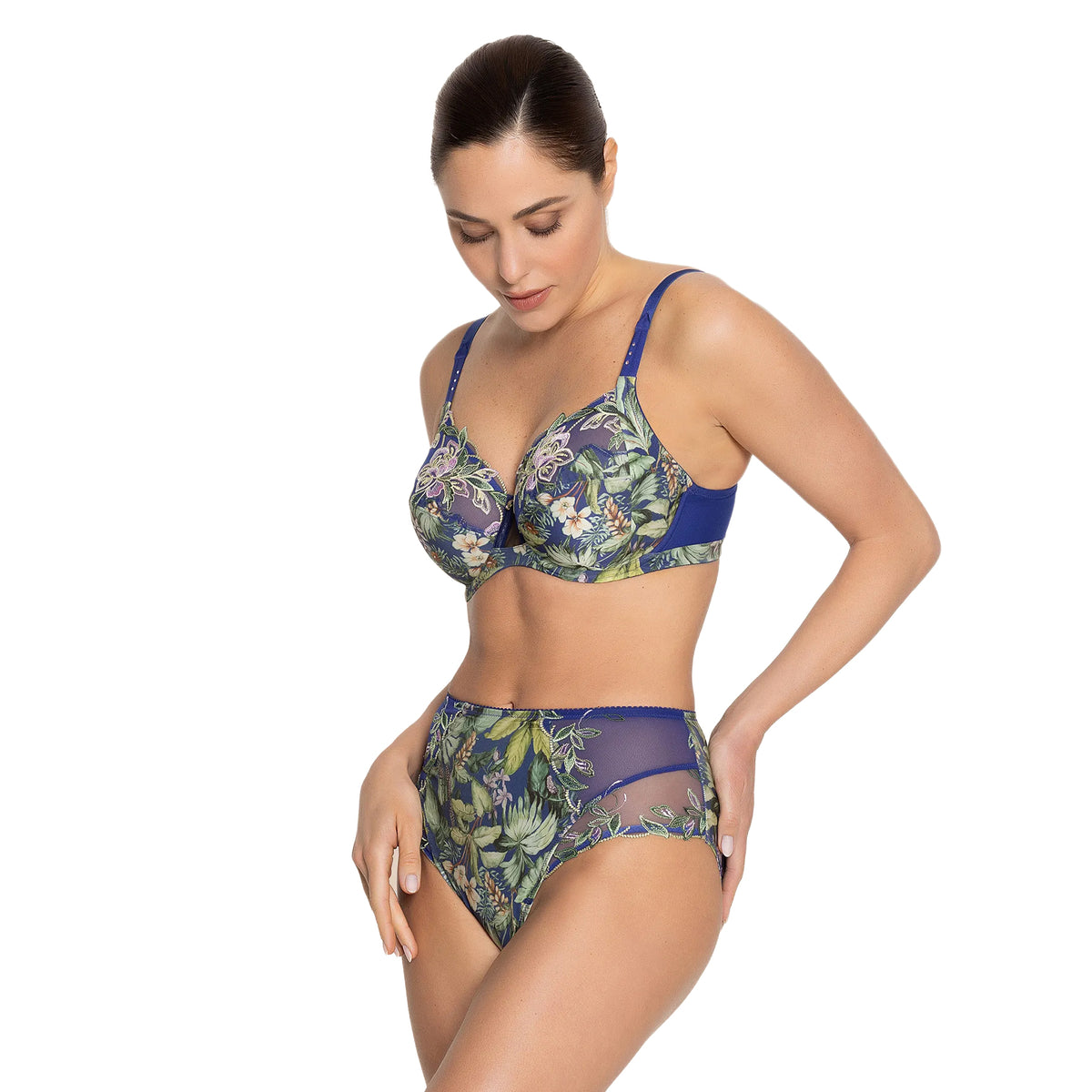 Side view of Lise Charmel Bain de Nature high brief highlighting the flattering high-rise silhouette, sheer embroidered sides, and vibrant floral design.
