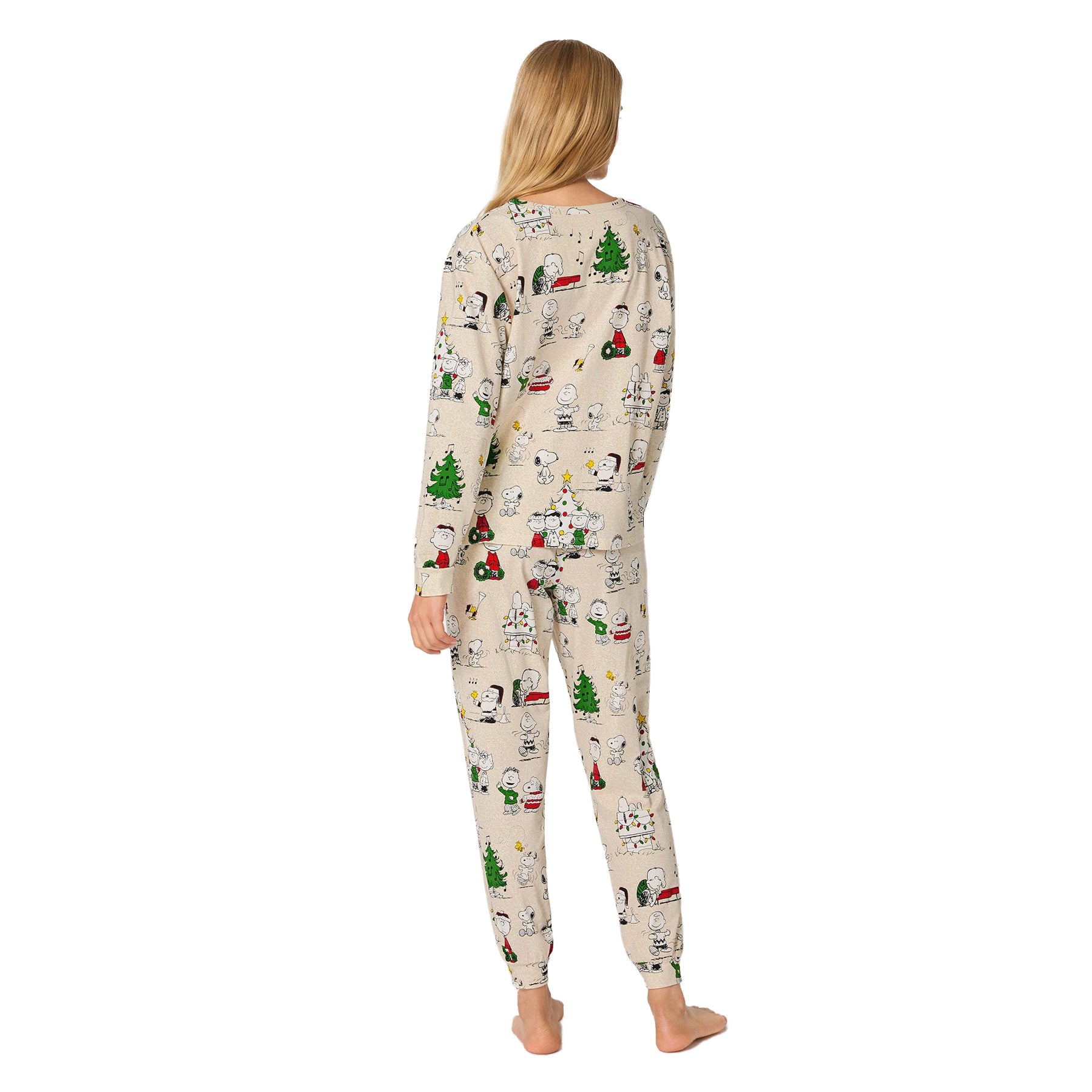 Person wearing a festive onesie with Christmas-themed design on a white background